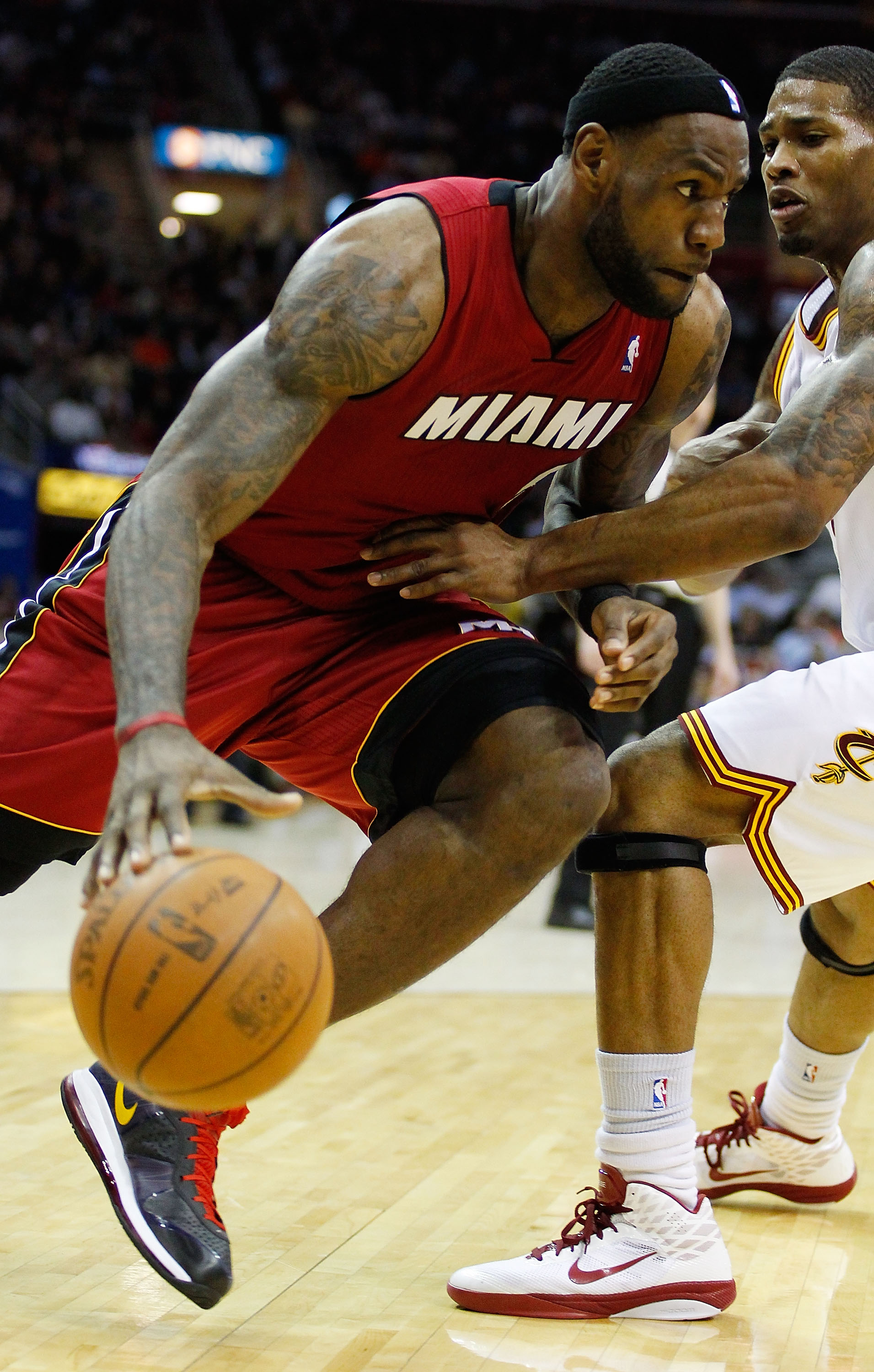 CLEVELAND - MARCH 29: LeBron James #6 of the Miami Heat drives to the basket during the game against the Cleveland Cavaliers on March 29, 2011 at Quicken Loans Arena in Cleveland, Ohio. NOTE TO USER: User expressly acknowledges and agrees that, by downlo