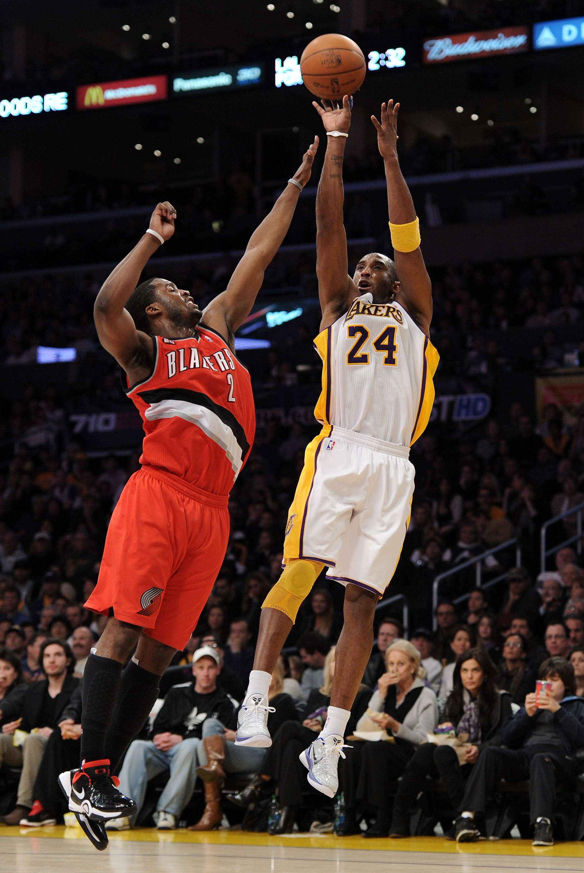 LOS ANGELES, CA - MARCH 20:  Kobe Bryant #24 of the Los Angeles Lakers shoots a jumper over Wesley Matthews #2 of the Portland Trail Blazers at the Staples Center on March 20, 2011 in Los Angeles, California.  NOTE TO USER: User expressly acknowledges and