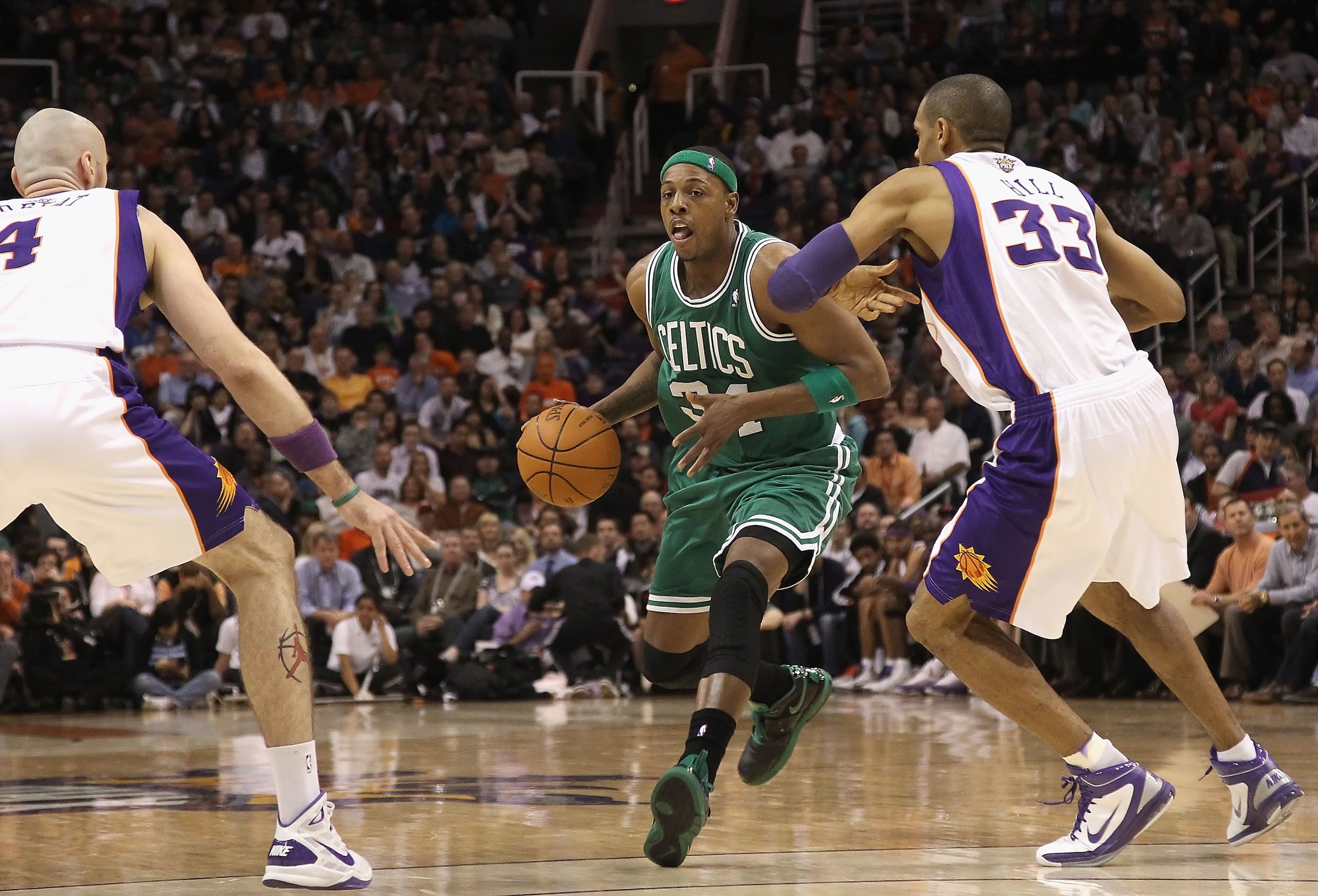 PHOENIX, AZ - JANUARY 28:  Paul Pierce #34 of the Boston Celtics handles the ball during the NBA game against the Phoenix Suns at US Airways Center on January 28, 2011 in Phoenix, Arizona. The Suns defeated the Celtics 88-71. NOTE TO USER: User expressly