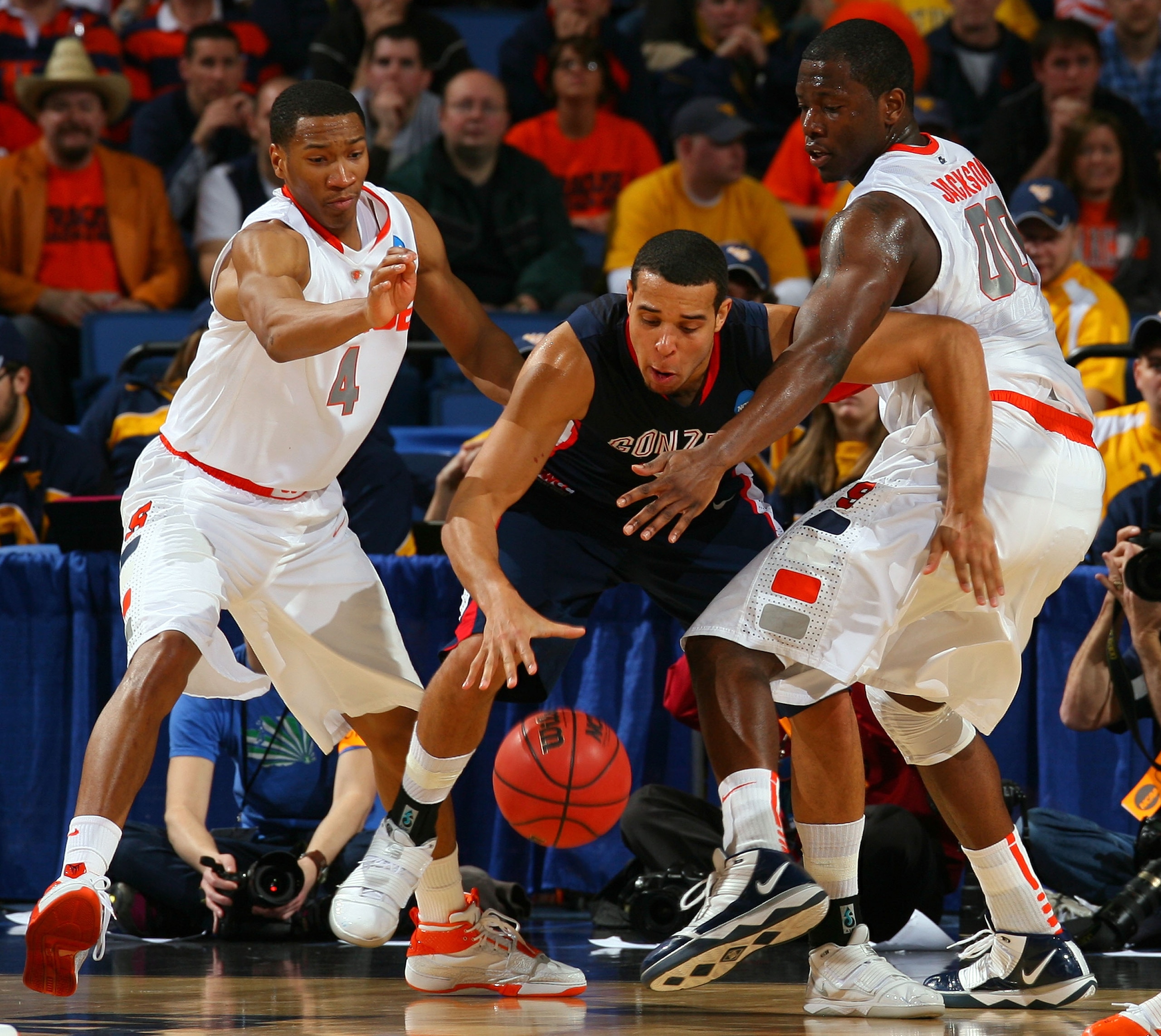 BUFFALO, NY - MARCH 21:  Wes Johnson #4 and Rick Jackson #00 of the Syracuse Orange defend against Elias Harris #20 of the Gonzaga Bulldogs during the second round of the 2010 NCAA men's basketball tournament at HSBC Arena at HSBC Arena on March 21, 2010