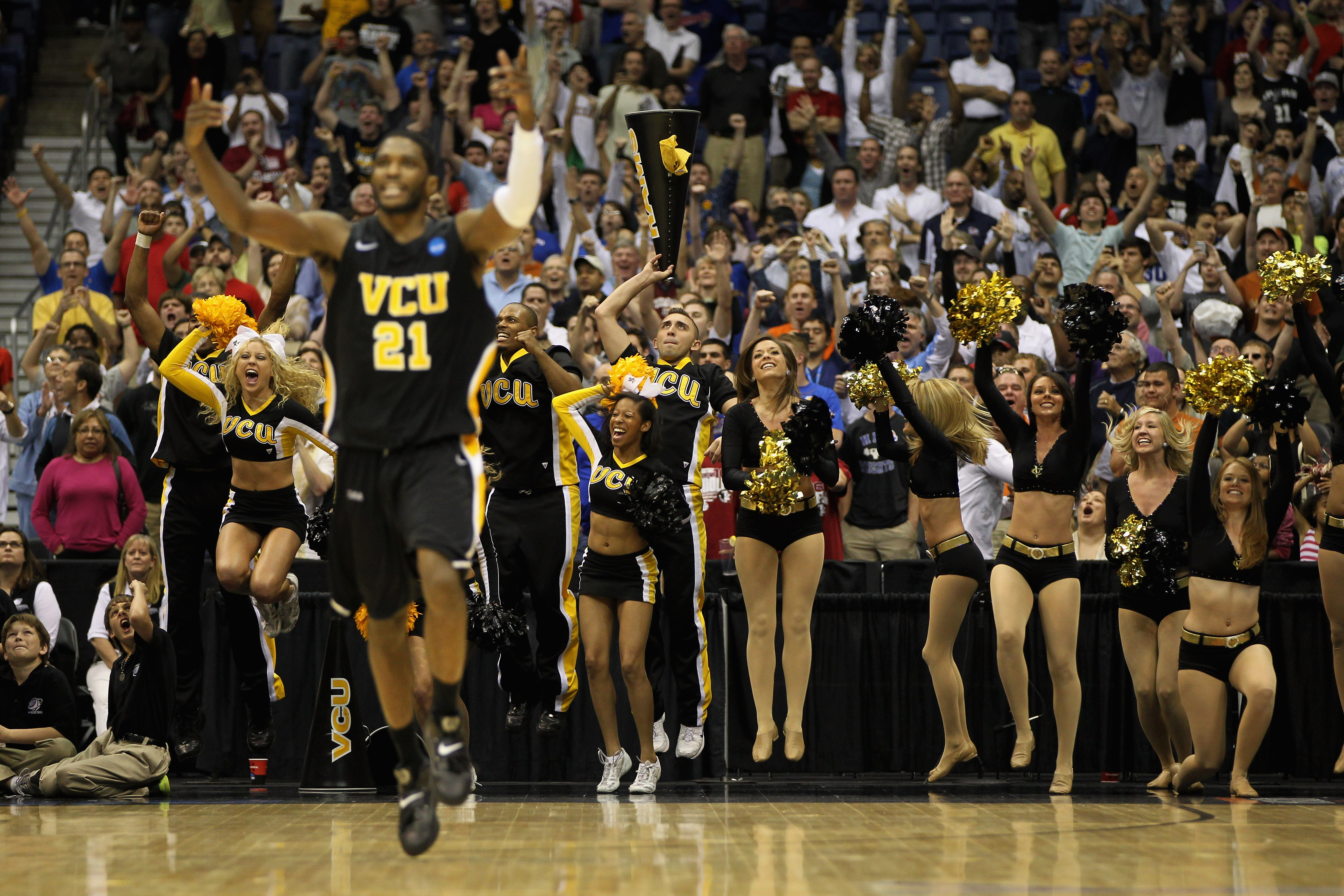 SAN ANTONIO, TX - MARCH 25:  Jamie Skeen #21 of the Virginia Commonwealth Rams and the VCU fans celebrate after defeating the Florida State Seminoles during the southwest regional of the 2011 NCAA men's basketball tournament at the Alamodome on March 25,