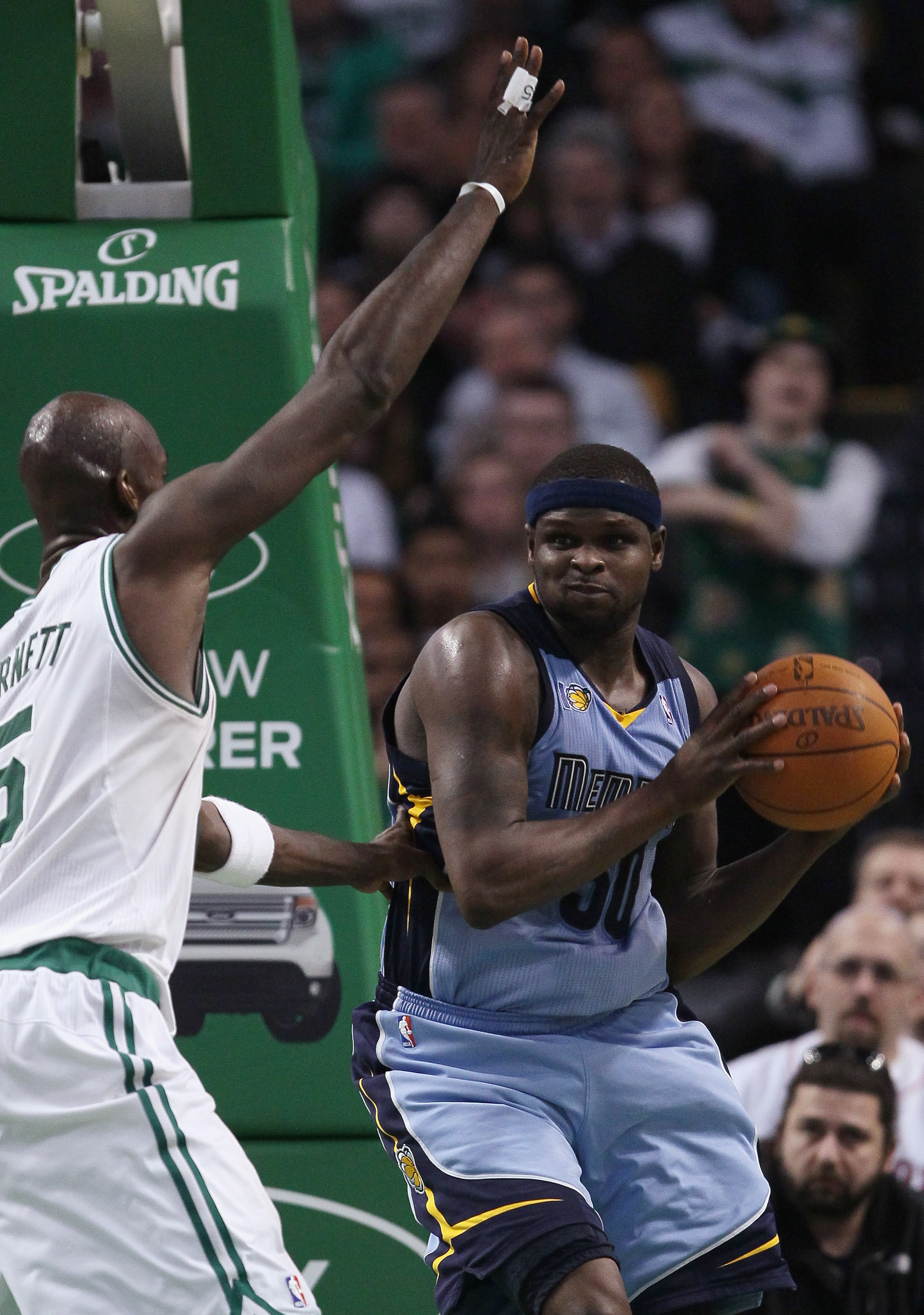 BOSTON, MA - MARCH 23: Zach Randolph #50 of the Memphis Grizzlies looks to pass around Kevin Garnett #5 of the Boston Celtics on March 23, 2011 at the TD Garden in Boston, Massachusetts. The Memphis Grizzlies defeated the Boston Celtics 90-87. NOTE TO U BOSTON, MA - MARCH 23: Zach Randolph #50 of the Memphis Grizzlies looks to pass around Kevin Garnett #5 of the Boston Celtics on March 23, 2011 at the TD Garden in Boston, Massachusetts. The Memphis Grizzlies defeated the Boston Celtics 90-87. NOTE TO U