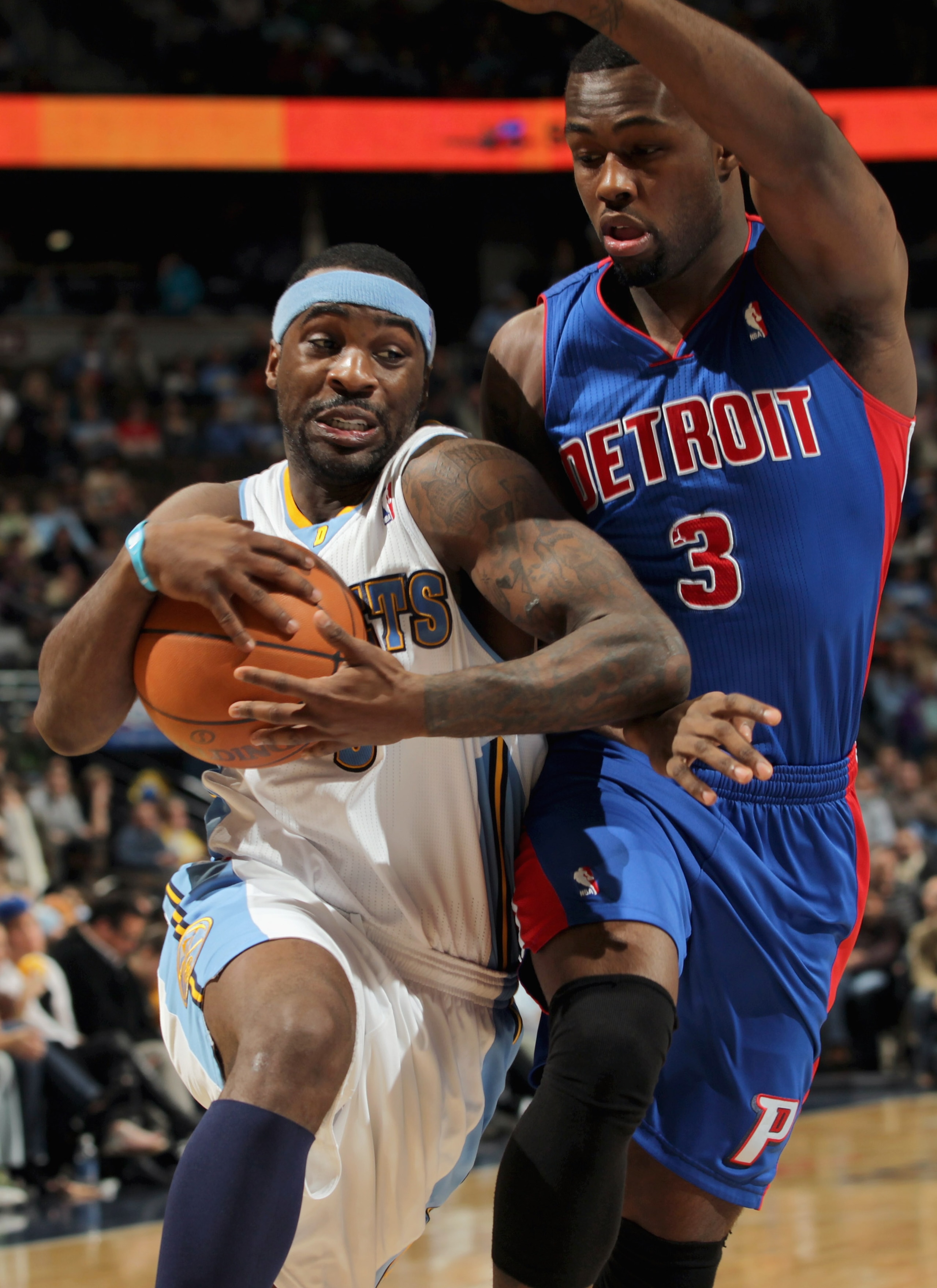 DENVER, CO - MARCH 12: Ty Lawson #3 of the Denver Nuggets drives to the basket against the defense of Rodney Stuckey #3 of the Detroit Pistons at the Pepsi Center on March 12, 2011 in Denver, Colorado. The Nuggets defeated the Pistons 131-101. NOTE TO U DENVER, CO - MARCH 12: Ty Lawson #3 of the Denver Nuggets drives to the basket against the defense of Rodney Stuckey #3 of the Detroit Pistons at the Pepsi Center on March 12, 2011 in Denver, Colorado. The Nuggets defeated the Pistons 131-101. NOTE TO U