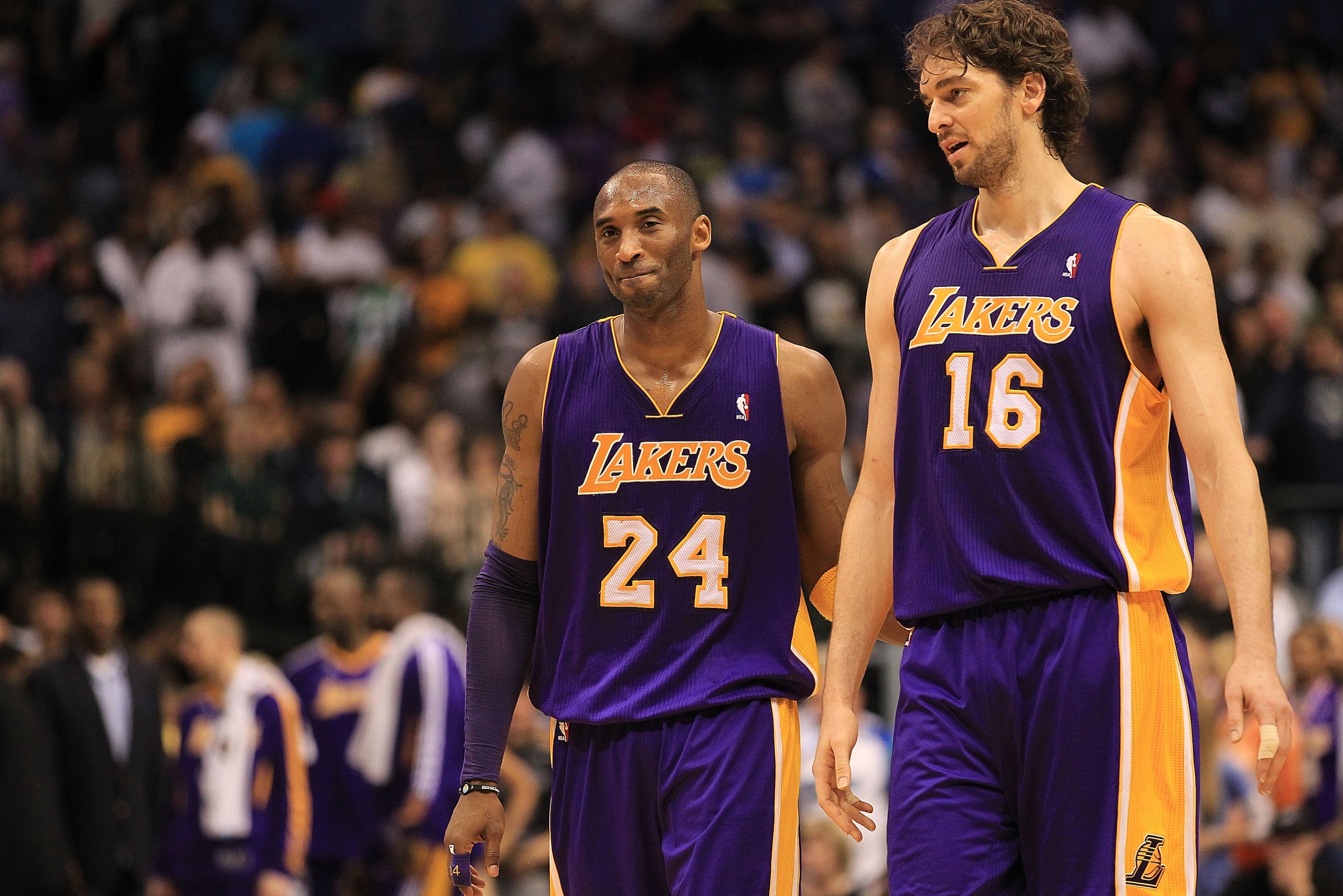 DALLAS, TX - MARCH 12: Kobe Bryant #24 and Pau Gasol #16 of the Los Angeles Lakers react after a 96-91 win against the Dallas Mavericks at American Airlines Center on March 12, 2011 in Dallas, Texas. NOTE TO USER: User expressly acknowledges and agrees DALLAS, TX - MARCH 12: Kobe Bryant #24 and Pau Gasol #16 of the Los Angeles Lakers react after a 96-91 win against the Dallas Mavericks at American Airlines Center on March 12, 2011 in Dallas, Texas. NOTE TO USER: User expressly acknowledges and agrees