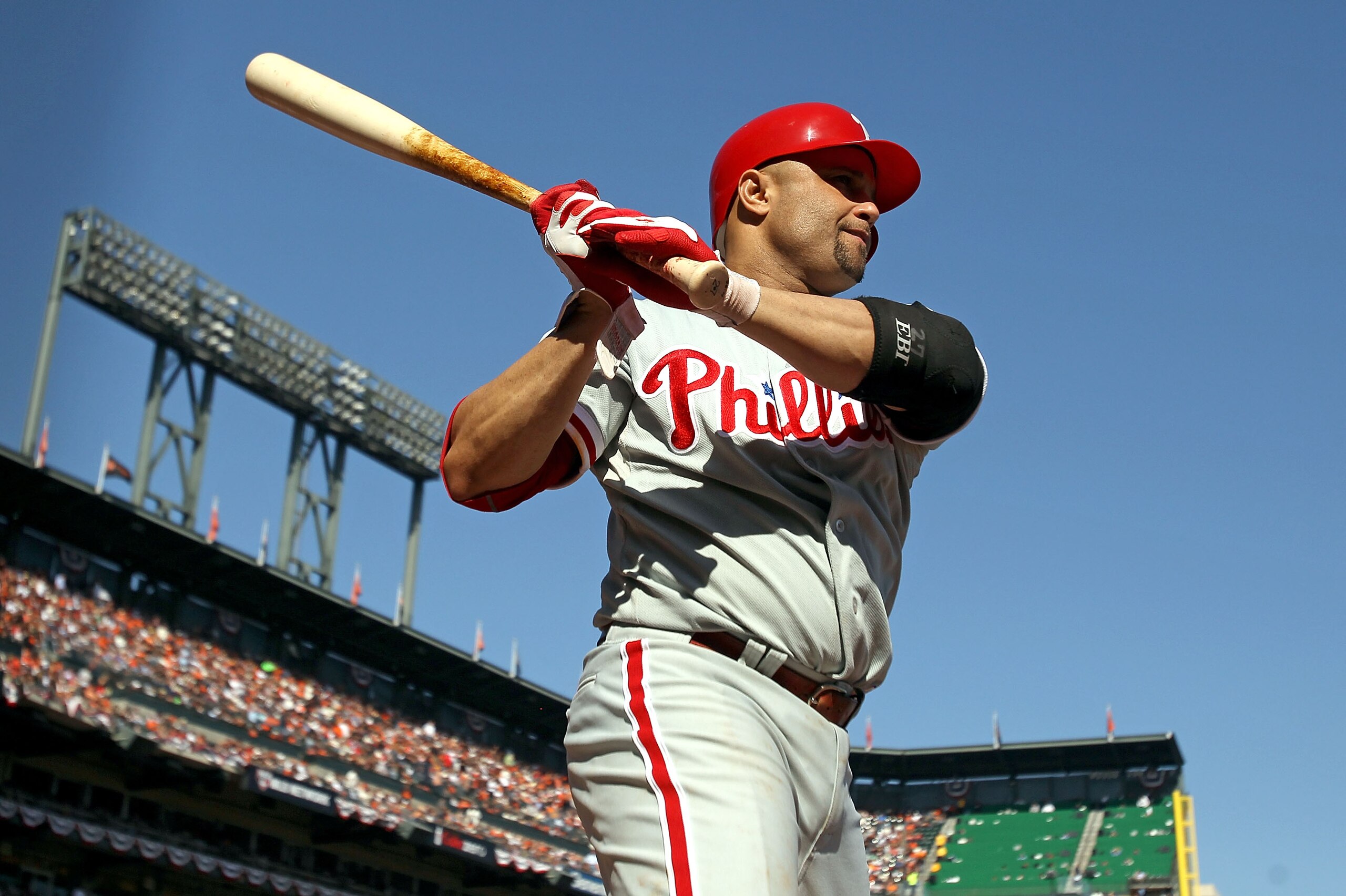 SAN FRANCISCO - OCTOBER 19:  Placido Polanco #27 of the Philadelphia Phillies stands on deck against the San Francisco Giants in Game Three of the NLCS during the 2010 MLB Playoffs at AT&T Park on October 19, 2010 in San Francisco, California.  (Photo by