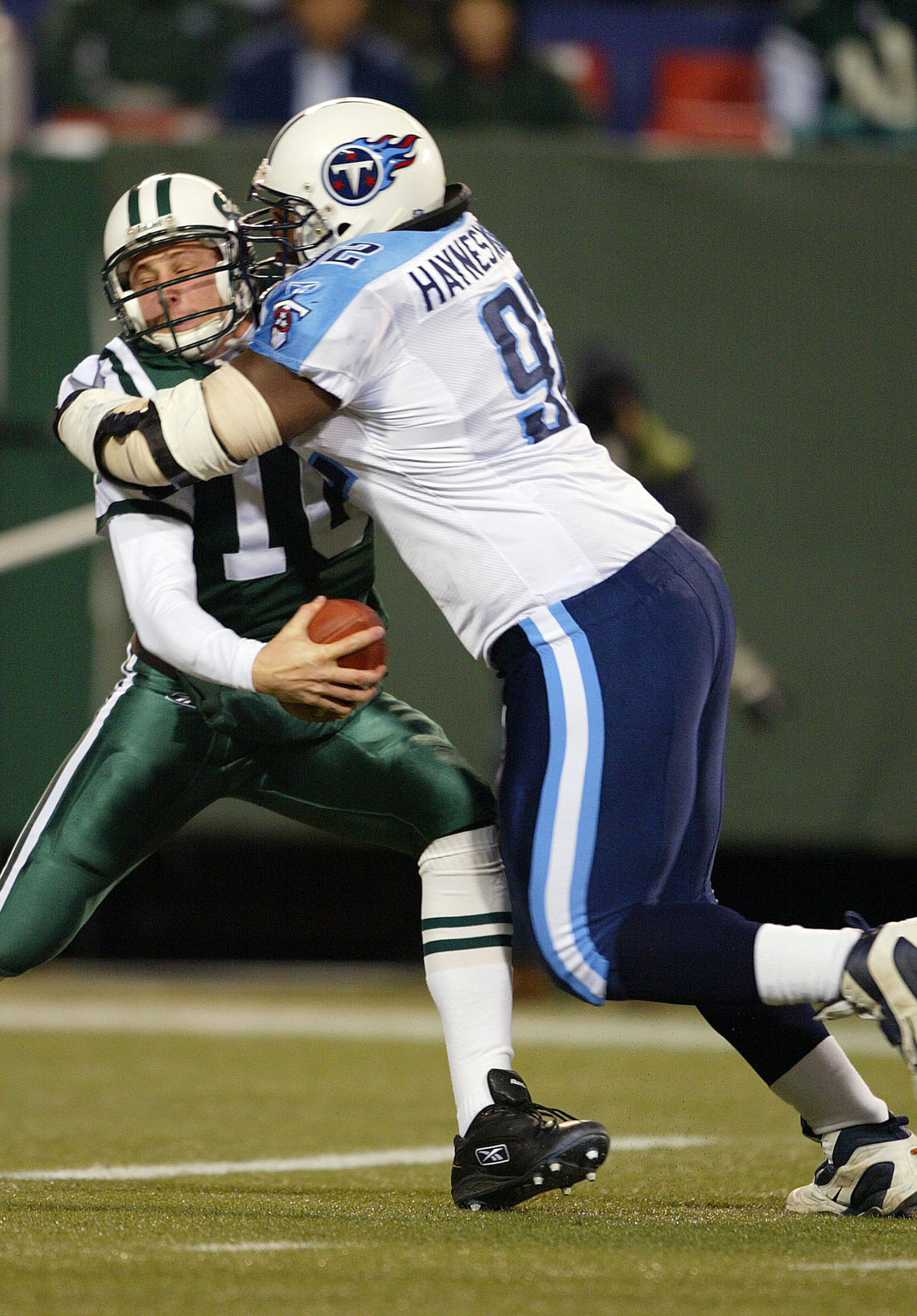 EAST RUTHERFORD, NJ - DECEMBER 1: Chad Pennington #10 of the New York Jets is sacked by Albert Haynesworth #92 of the Tennesee Titans in the second quarter during their game at Giants Stadium on December 1, 2003 in East Rutherford, New Jersey. (Photo by EAST RUTHERFORD, NJ - DECEMBER 1: Chad Pennington #10 of the New York Jets is sacked by Albert Haynesworth #92 of the Tennesee Titans in the second quarter during their game at Giants Stadium on December 1, 2003 in East Rutherford, New Jersey. (Photo by