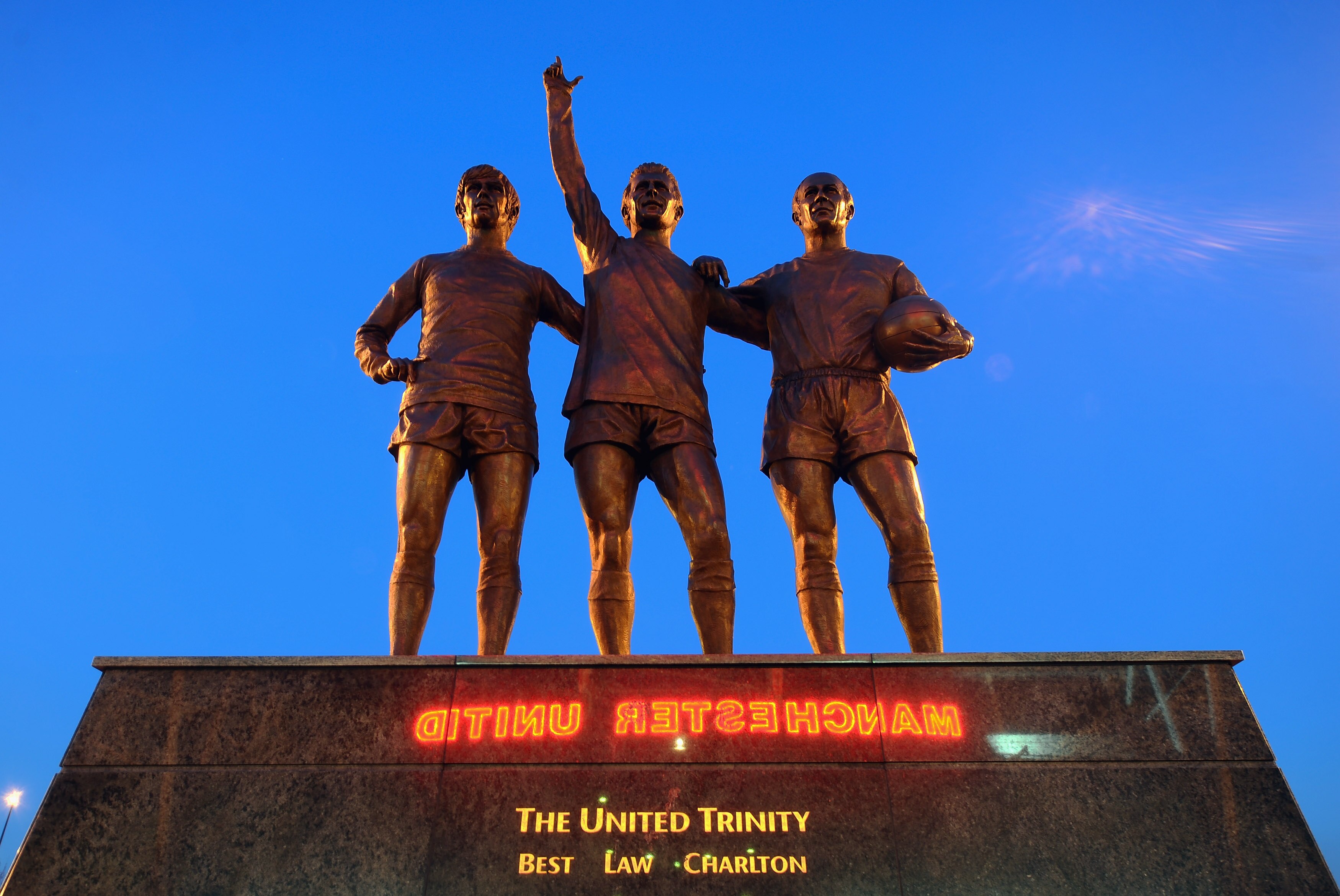 MANCHESTER, UNITED KINGDOM - MARCH 02:  A statue of George Best, Denis Law and Bobby Charlton standing outside Old Trafford, home of Manchester United on March 2, 2011 in Manchester, England.  (Photo by Mike Hewitt/Getty Images)