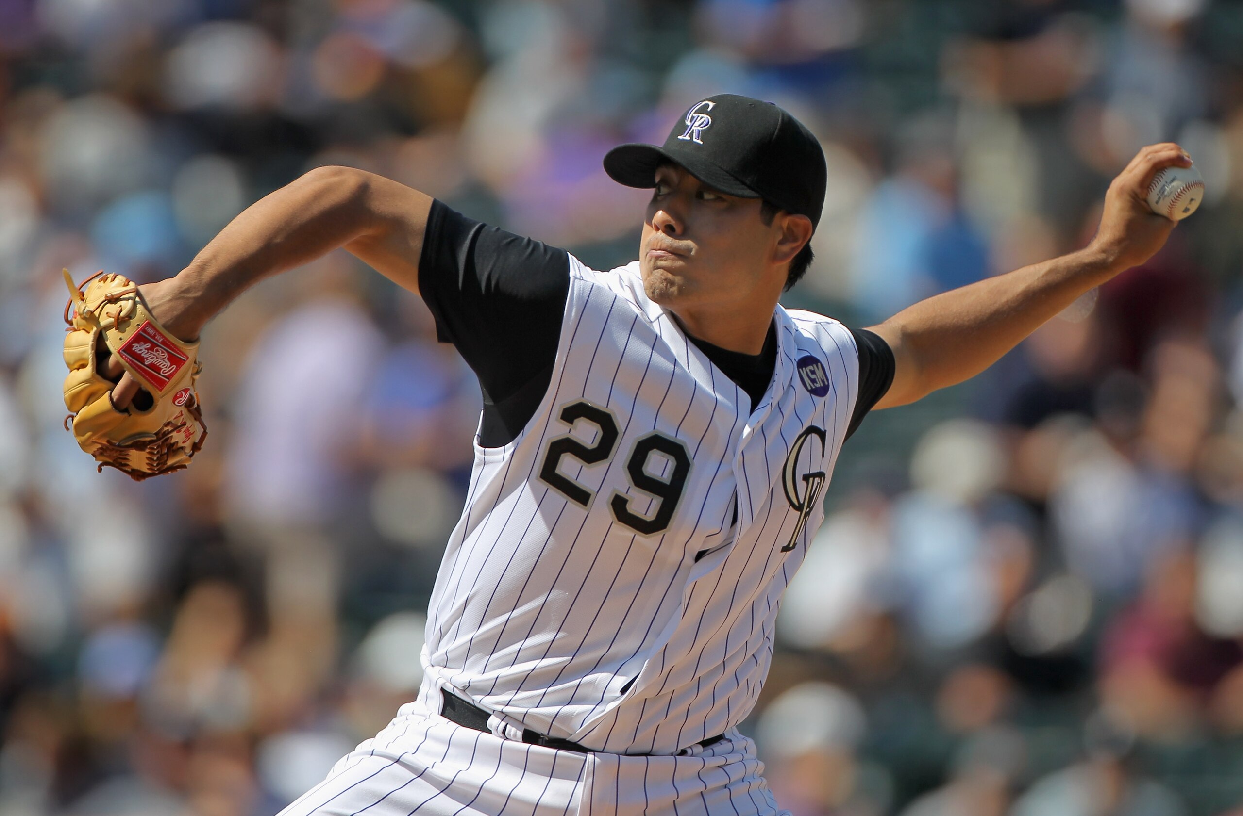 DENVER - SEPTEMBER 15:  Starting pitcher Jorge De La Rosa #29 of the Colorado Rockies delivers against the San Diego Padres at Coors Field on September 15, 2010 in Denver, Colorado.  (Photo by Doug Pensinger/Getty Images)