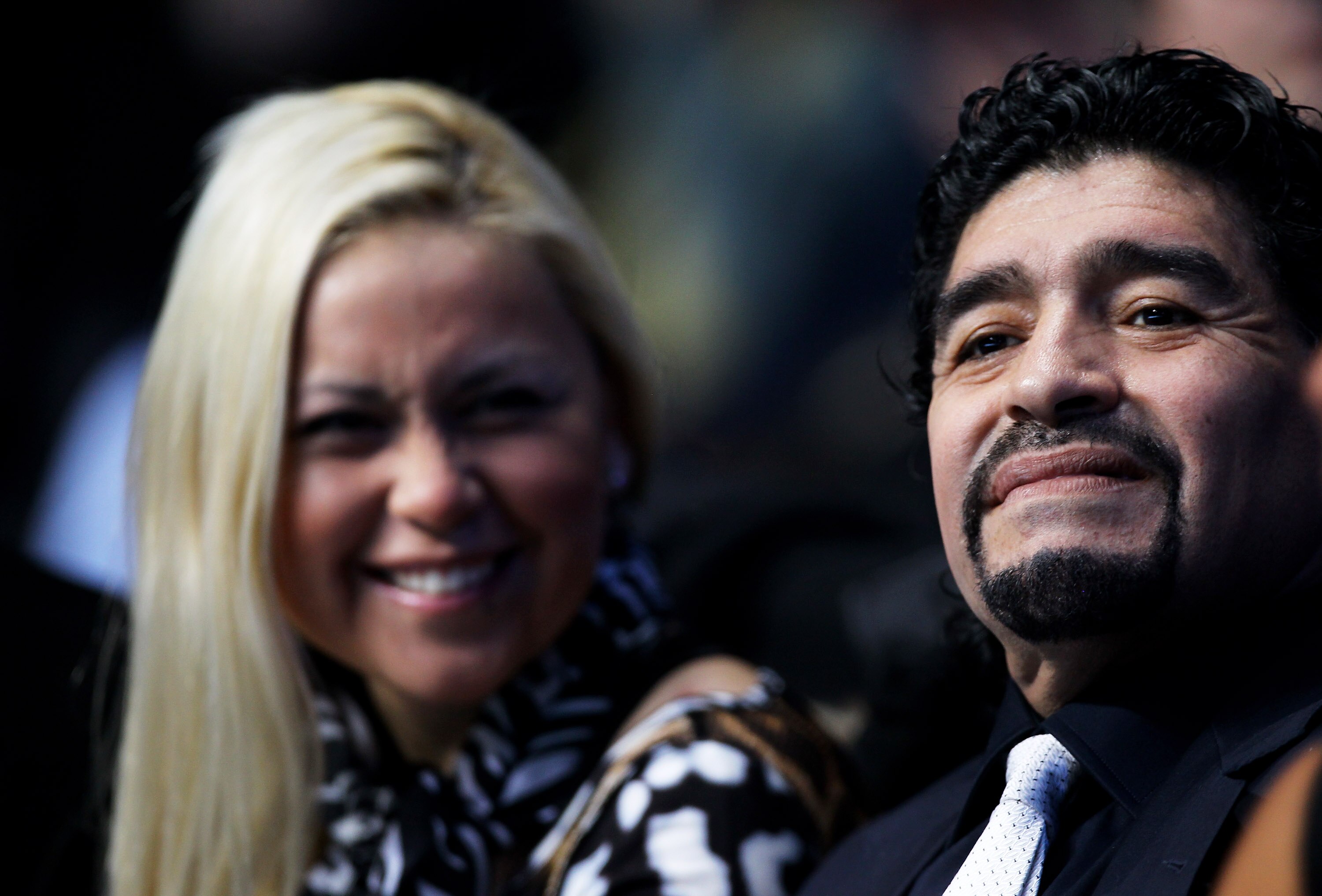 LONDON, ENGLAND - NOVEMBER 28:  Former Argentinian footballer Diego Maradona and Veronica Ojeda attand the men's final between Rafael Nadal of Spain and Roger Federer of Switzerland during the ATP World Tour Finals at O2 Arena on November 28, 2010 in Lond