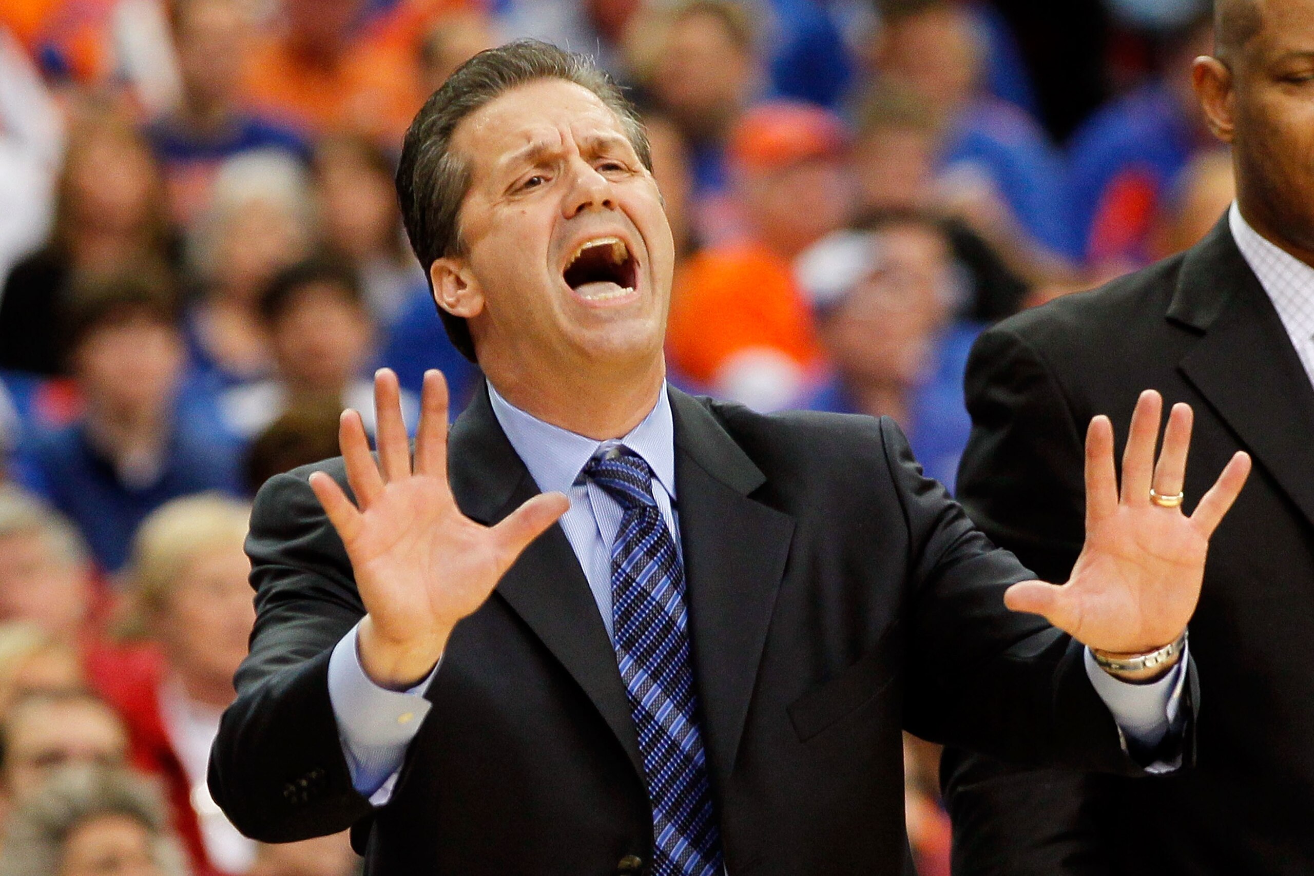 ATLANTA, GA - MARCH 12:  Head coach John Calipari of the Kentucky Wildcats coaches against the Alabama Crimson Tide during the semifinals of the SEC Men's Basketball Tournament at Georgia Dome on March 12, 2011 in Atlanta, Georgia.  (Photo by Kevin C. Cox