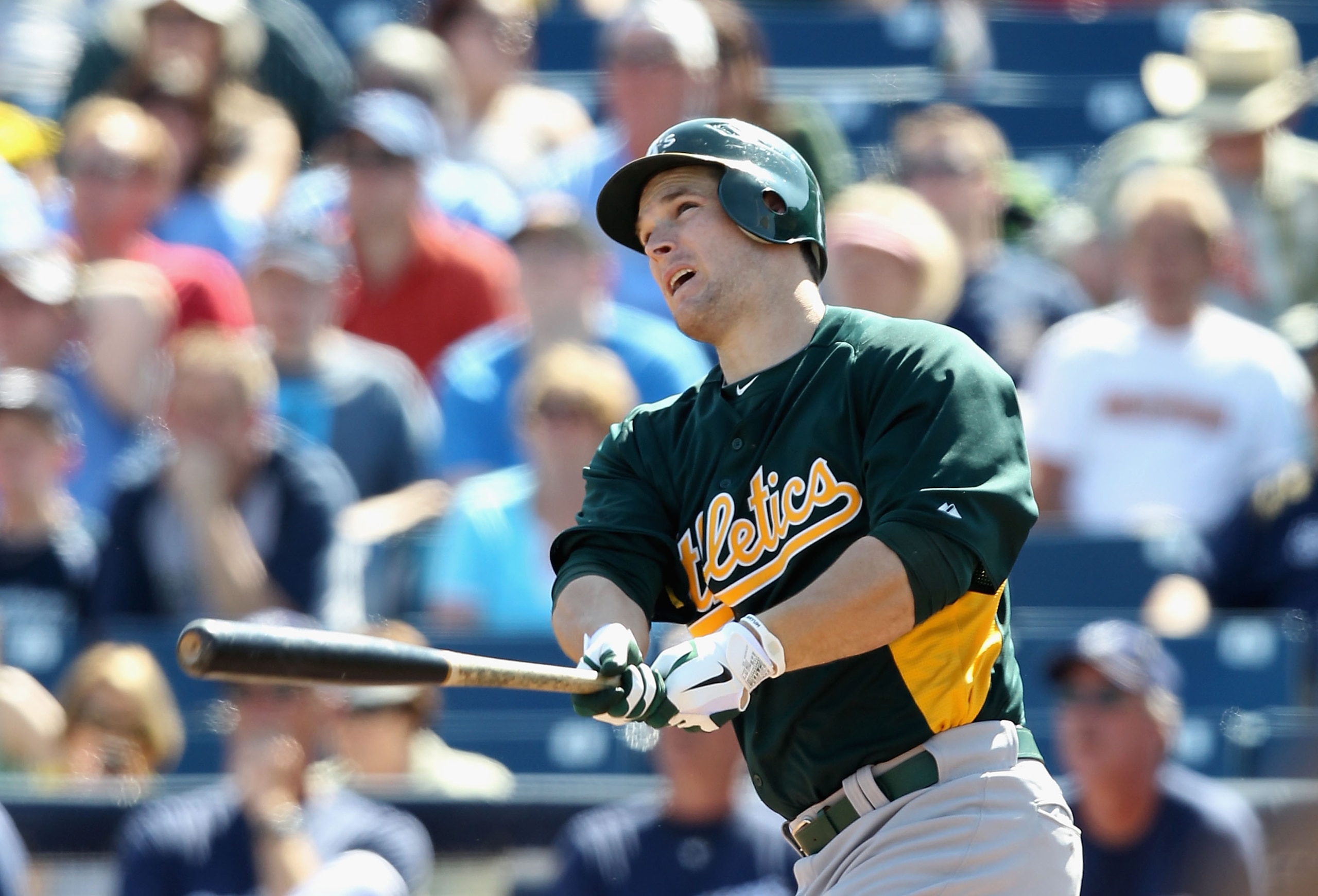 PHOENIX, AZ - MARCH 03:  Josh Willingham #16 of the Oakland Athletics hits a 3 run home run against the Milwaukee Brewers during the second inning of the spring training game at Maryvale Baseball Park on March 3, 2011 in Phoenix, Arizona.  (Photo by Chris
