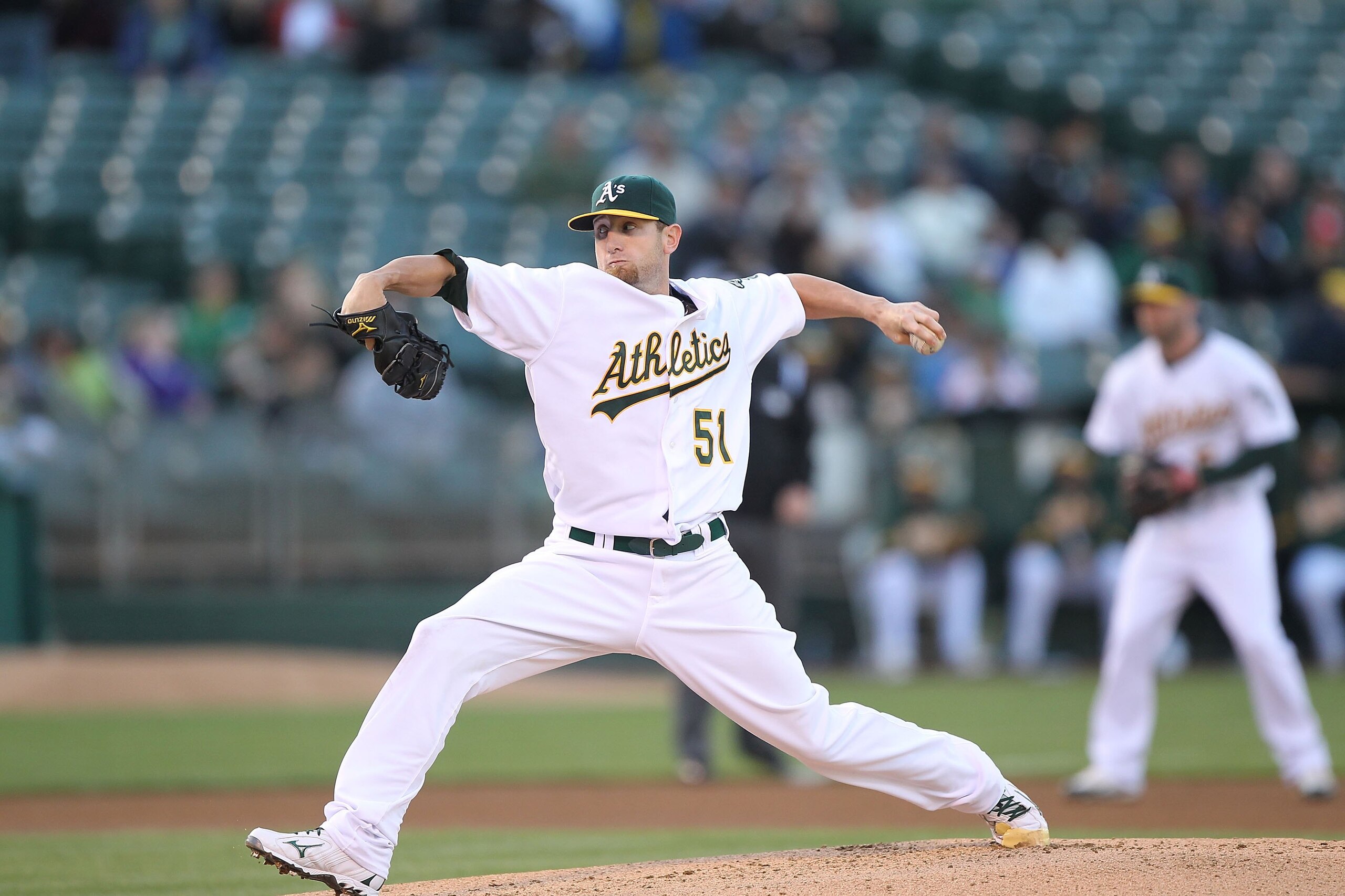 OAKLAND, CA - JUNE 09:  Dallas Braden #51 of the Oakland Athletics pitches against the Los Angeles Angels of Anaheim during an MLB game at the Oakland-Alameda County Coliseum on June 9, 2010 in Oakland, California.  (Photo by Jed Jacobsohn/Getty Images)