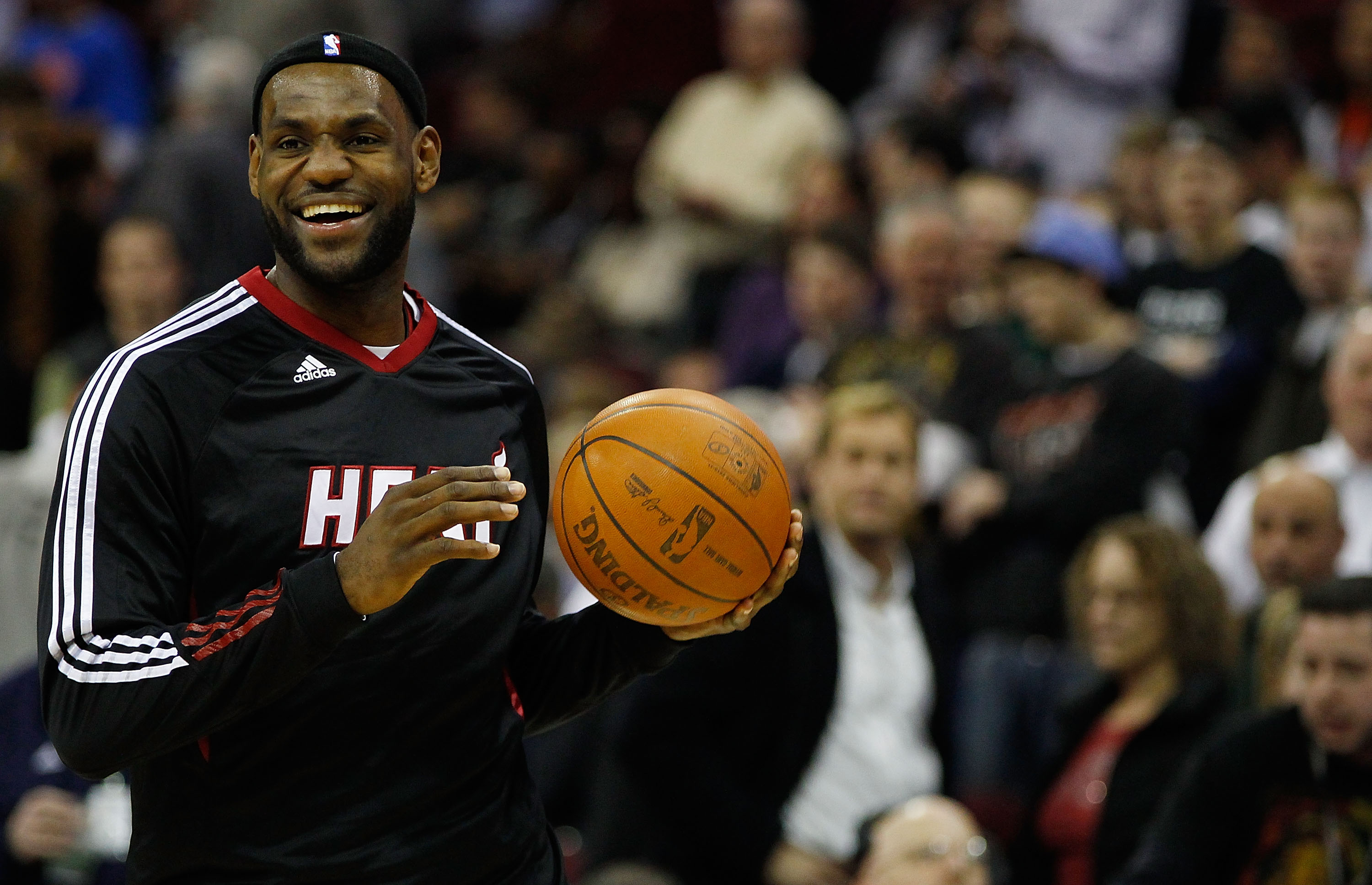 CLEVELAND - MARCH 29: LeBron James #6 of the Miami Heat laughs during pre-game warm-ups prior to the game against the Cleveland Cavaliers on March 29, 2011 at Quicken Loans Arena in Cleveland, Ohio. NOTE TO USER: User expressly acknowledges and agrees tha