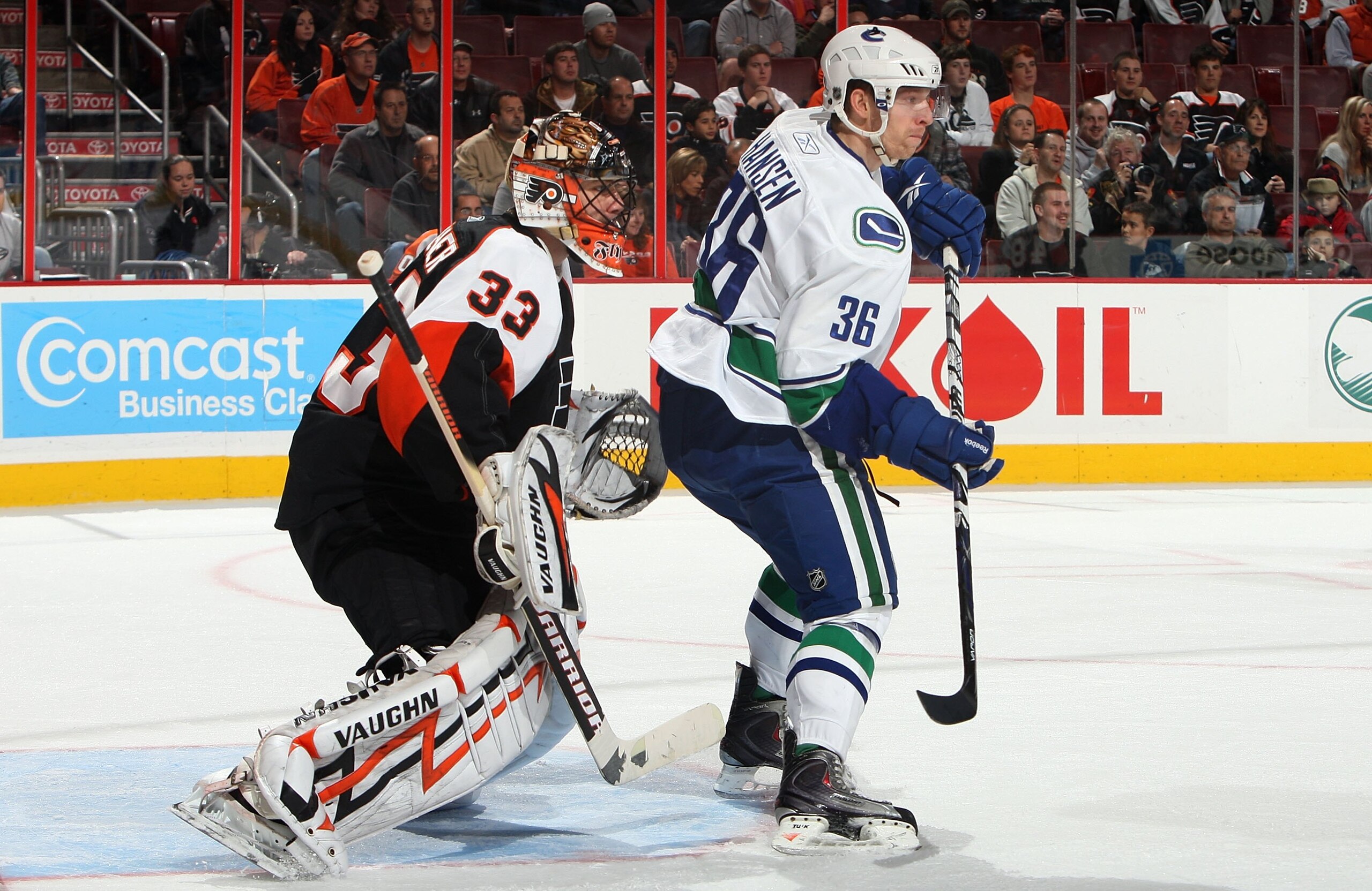 PHILADELPHIA - DECEMBER 03:  Jannik Hansen #36 of the Vancouver Canucks skates against Brian Boucher #33 of the Philadelphia Flyers on December 3, 2009 at Wachovia Center in Philadelphia, Pennsylvania. The Canucks defeated the Flyers 3-0.  (Photo by Jim M