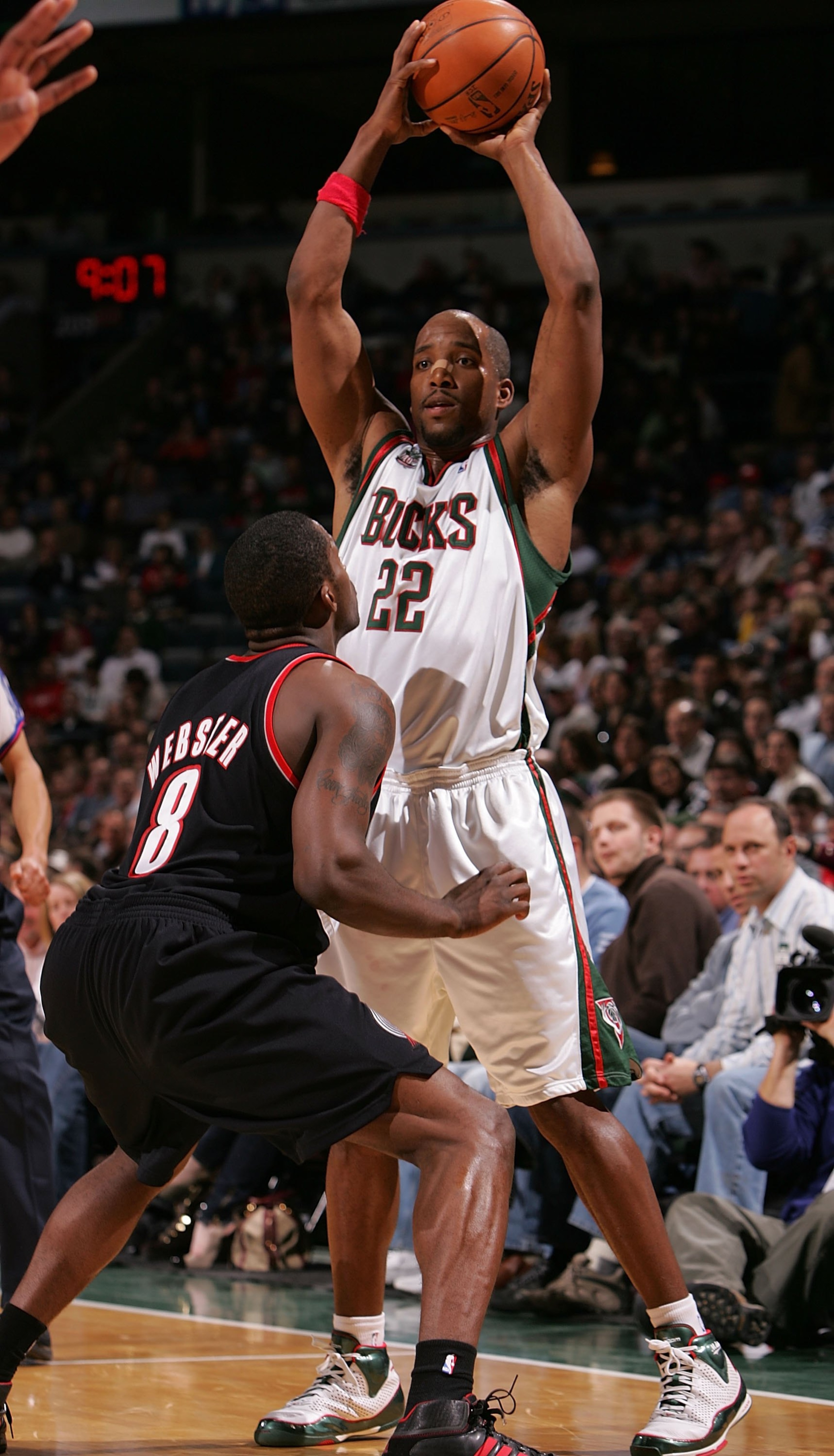 MILWAUKEE - MARCH 07: Michael Redd #22 of the Milwaukee Bucks looks to pass over Martell Webster #8 of the Portland Trail Blazers on March 7, 2008 at the Bradley Center in Milwaukee, Wisconsin. The Trail Blazers defeated the Bucks 103-101. NOTE TO USER: U