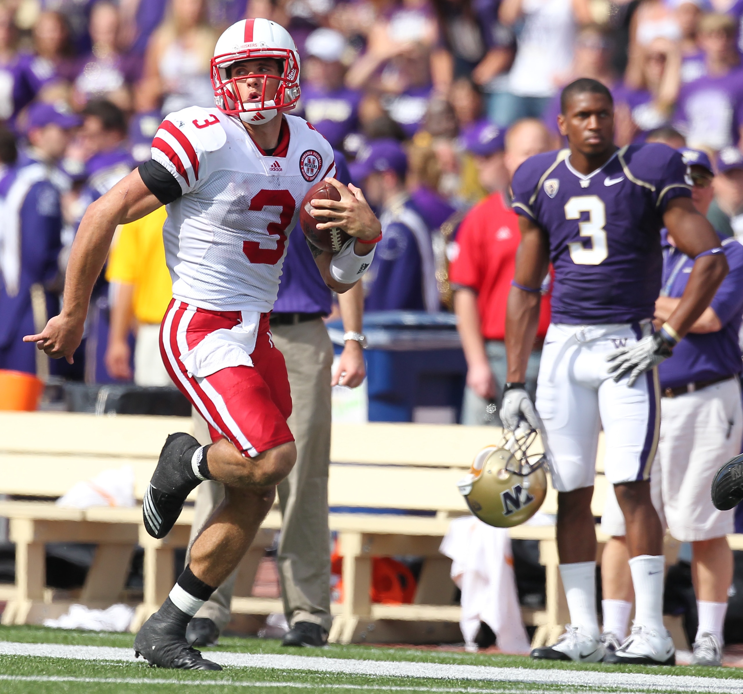 SEATTLE - SEPTEMBER 18: Quarterback Taylor Martinez #3 of the Nebraska Cornhuskers rushes for an 80 yard touchdown run in the third quarter against the Washington Huskies on September 18, 2010 at Husky Stadium in Seattle, Washington. The Cornhuskers defea