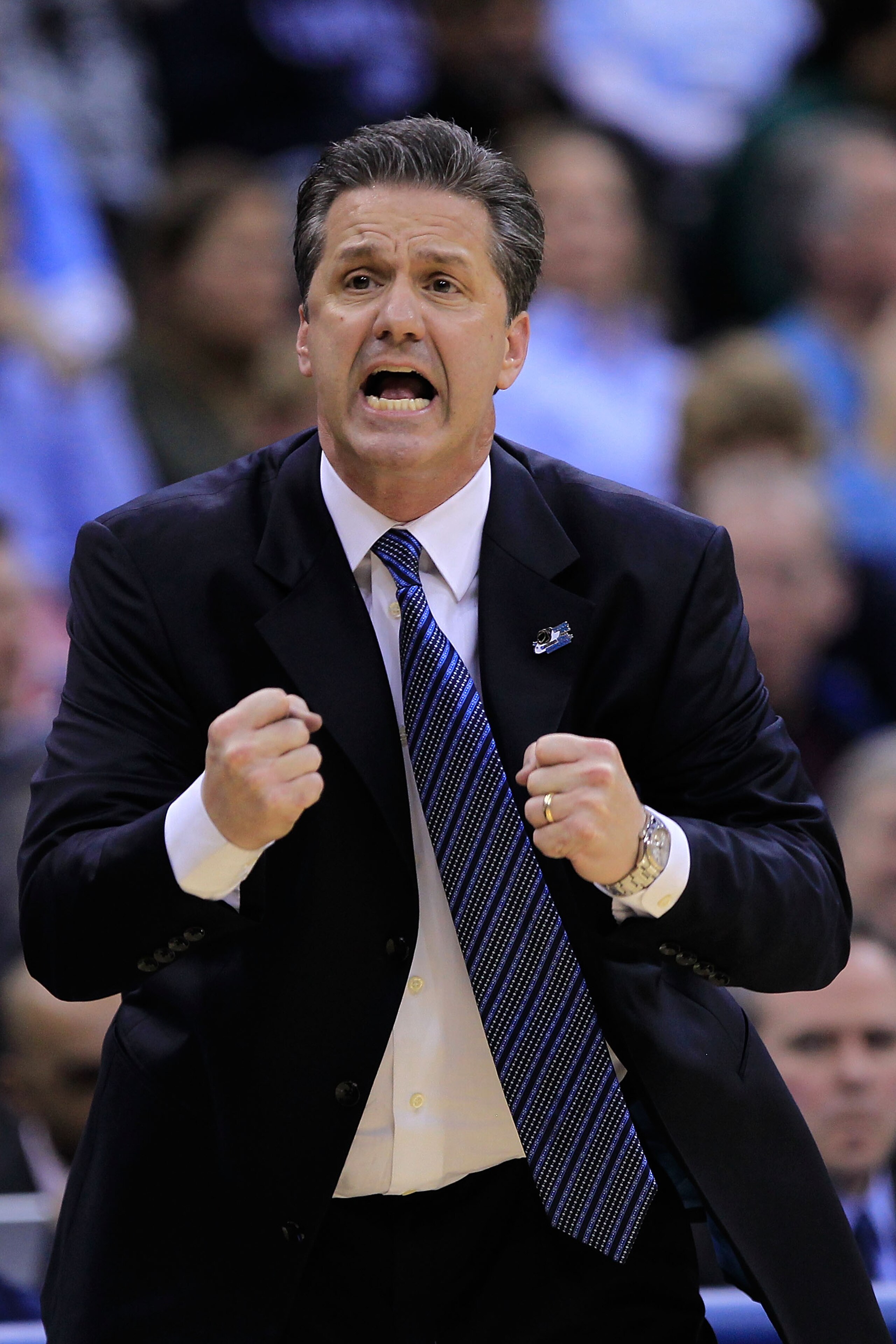 NEWARK, NJ - MARCH 27:  Head coach John Calipari of the Kentucky Wildcats reacts after a play against the North Carolina Tar Heels during the first half of the east regional final of the 2011 NCAA men's basketball tournament at Prudential Center on March