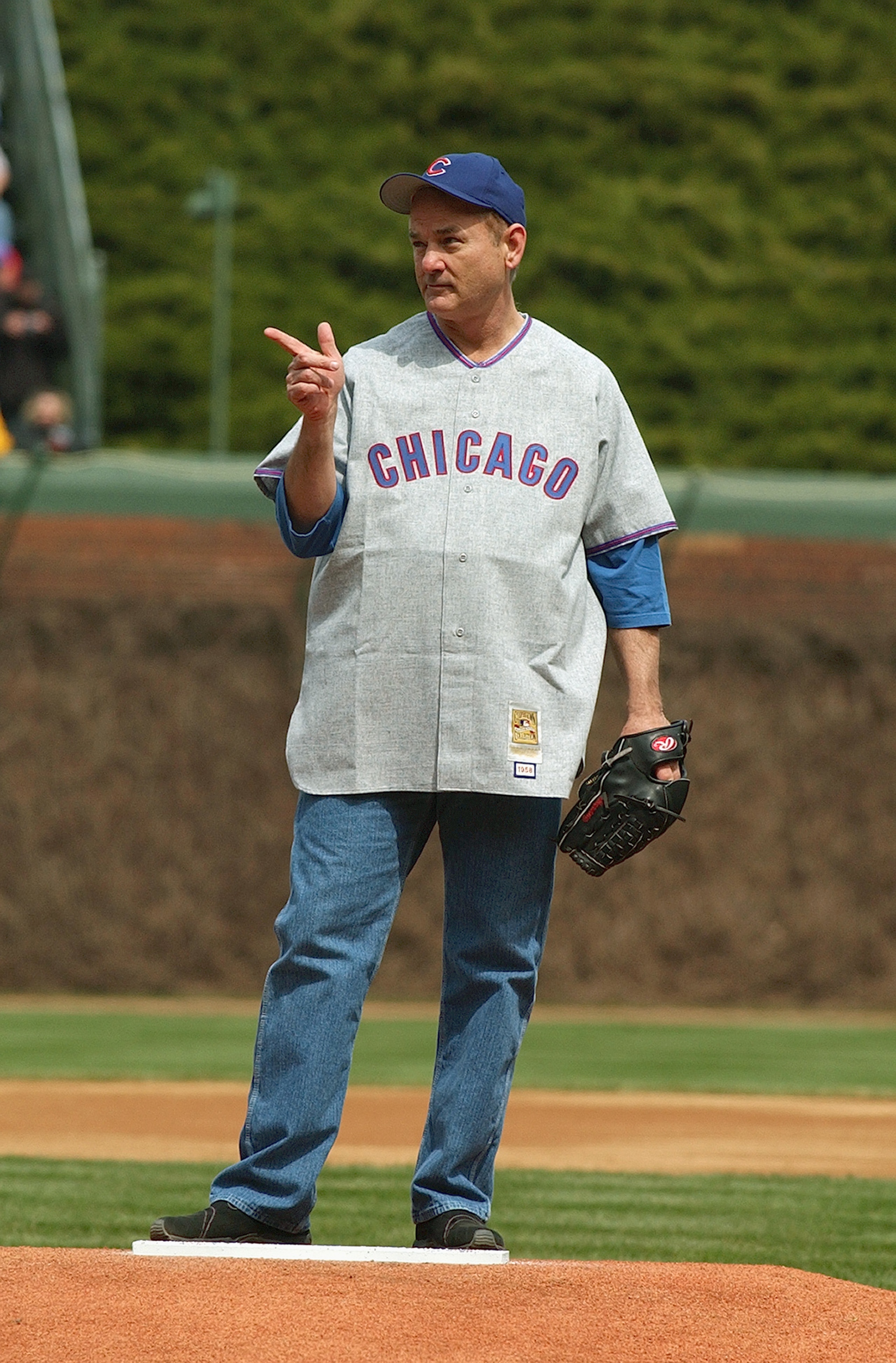 CHICAGO - APRIL 12:  Actor Bill Murray stands on the mound as he prepares to throw the ceremonial first pitch prior to the Chicago Cubs home opener against the Pittsburgh Pirates on April 12, 2004 at Wrigley Field in Chicago, Illinois. The Pirates defeate