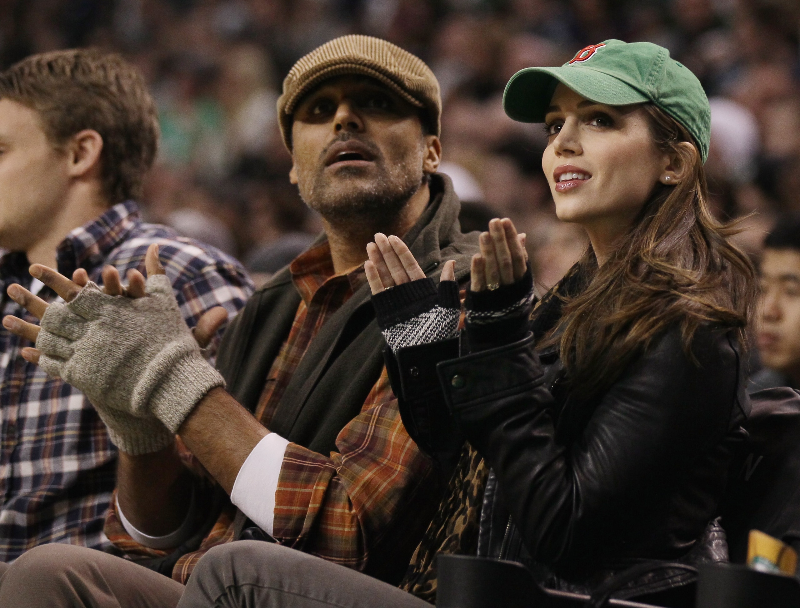 BOSTON - NOVEMBER 24:  Rick Fox (L) and Eliza Dushku watch the Boston Celtics take on the New Jersey Nets on November 24, 2010 at the TD Garden in Boston, Massachusetts. NOTE TO USER: User expressly acknowledges and agrees that, by downloading and/or usin