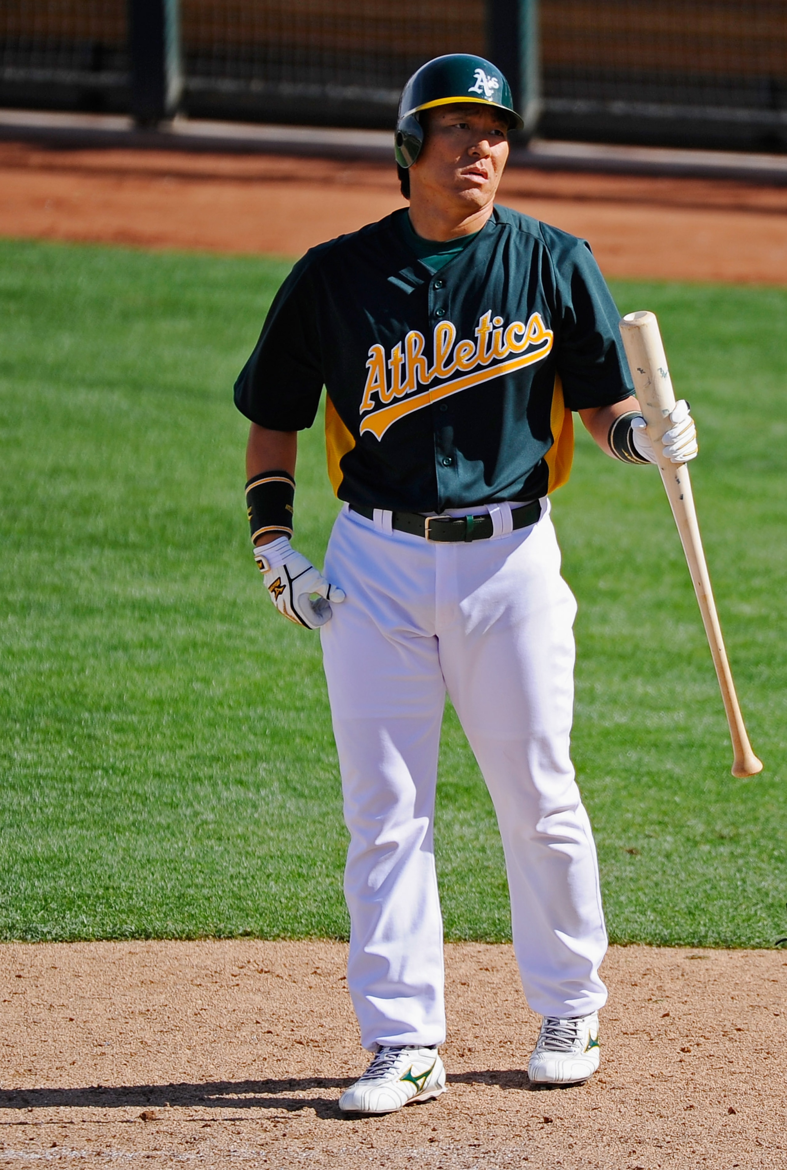 PHOENIX, AZ - MARCH 15:  Hideki Matsui #55 of the Oakland Athletics bats against the Chicago Cubs during the spring training baseball game at Phoenix Municipal Stadium on March 15, 2011 in Phoenix, Arizona.  (Photo by Kevork Djansezian/Getty Images)