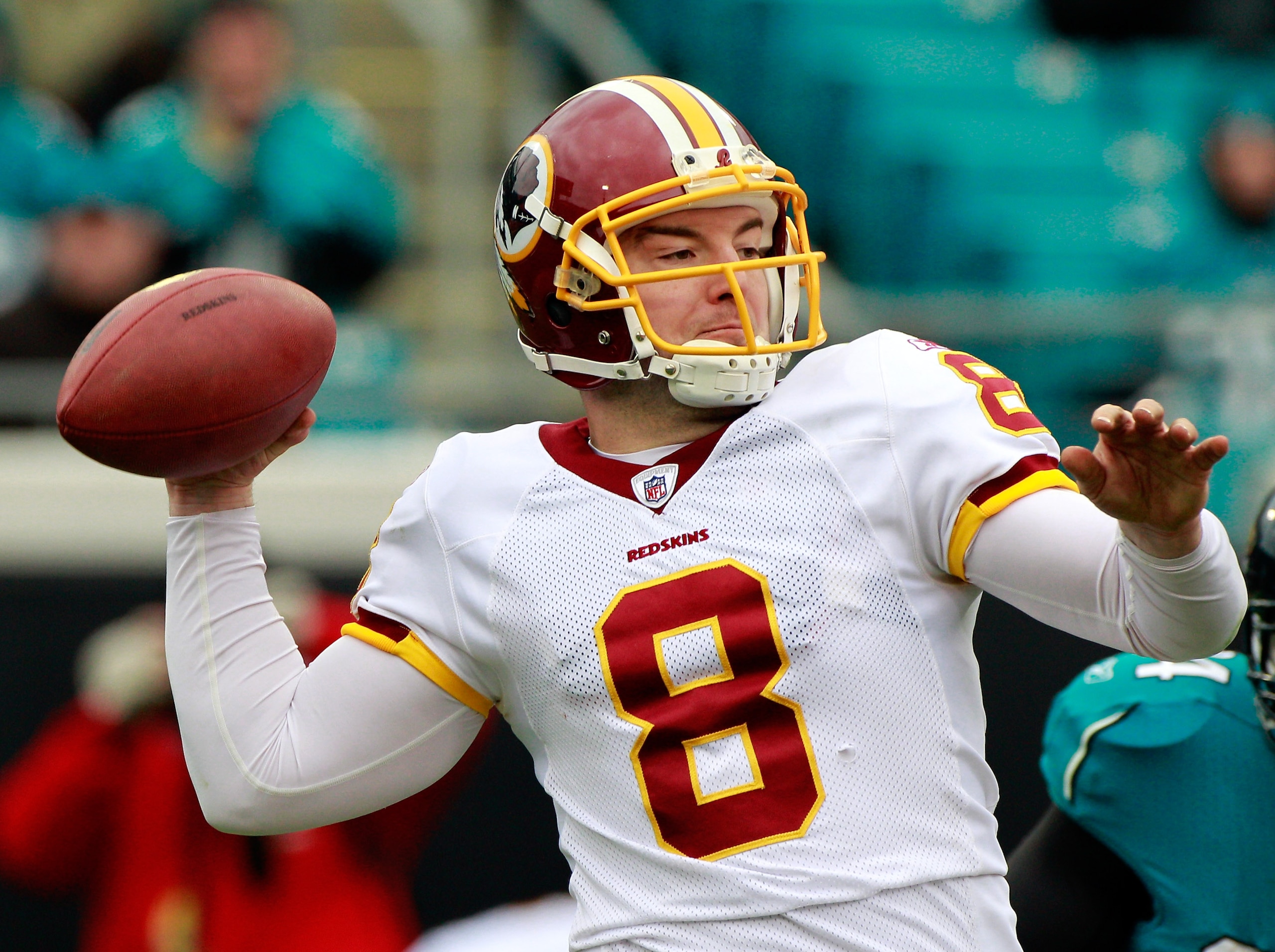 JACKSONVILLE, FL - DECEMBER 26:  Quarterback Rex Grossman #8 of the Washington Redskins attempts a pass during the game against the Jacksonville Jaguars at EverBank Field on December 26, 2010 in Jacksonville, Florida.  (Photo by Sam Greenwood/Getty Images