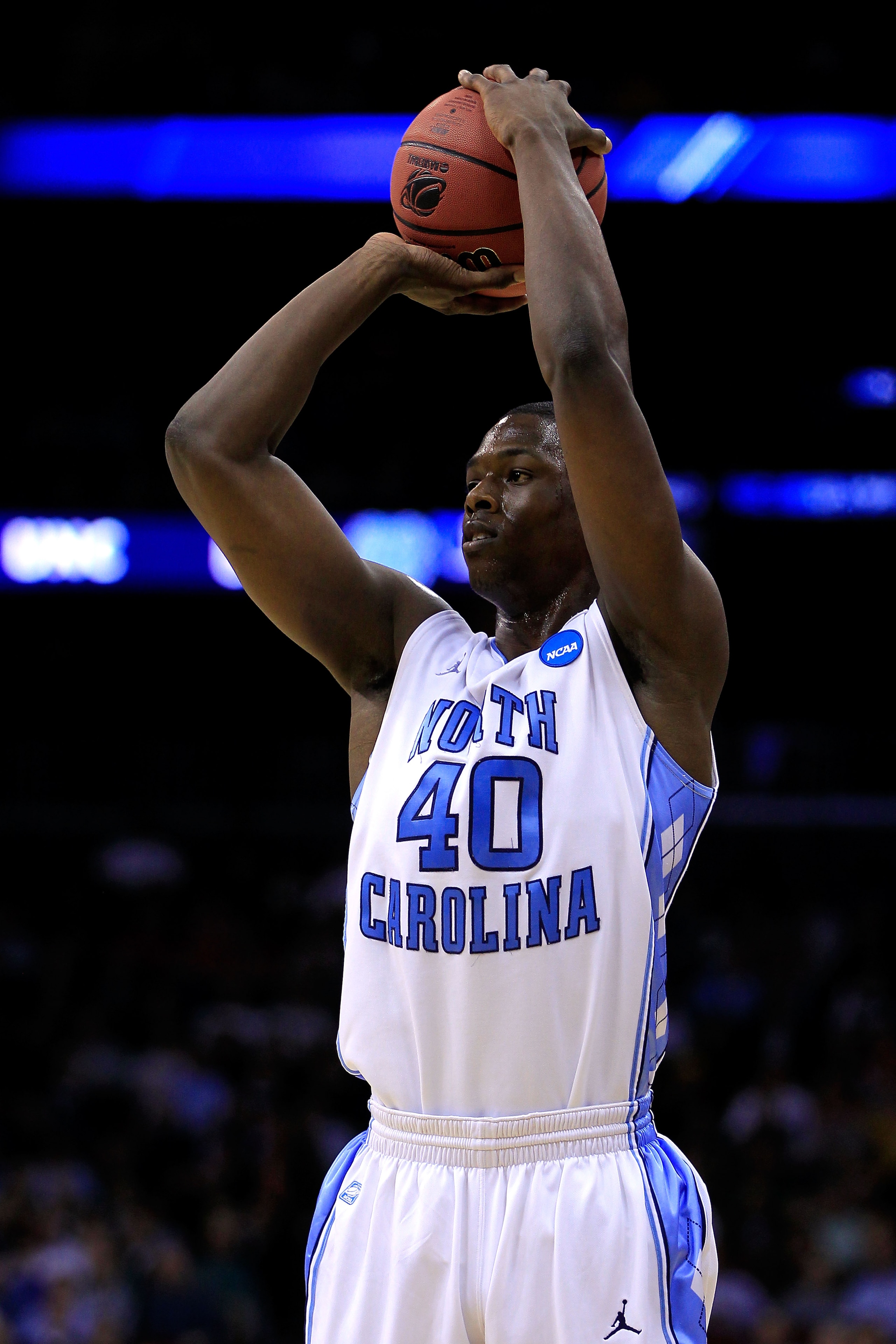 NEWARK, NJ - MARCH 25: Harrison Barnes #40 of the North Carolina Tar Heels takes a jump shot agianst the North Carolina Tar Heels during the first half of the east regional semifinal of the 2011 NCAA Men's Basketball Tournament at the Prudential Center o NEWARK, NJ - MARCH 25: Harrison Barnes #40 of the North Carolina Tar Heels takes a jump shot agianst the North Carolina Tar Heels during the first half of the east regional semifinal of the 2011 NCAA Men's Basketball Tournament at the Prudential Center o