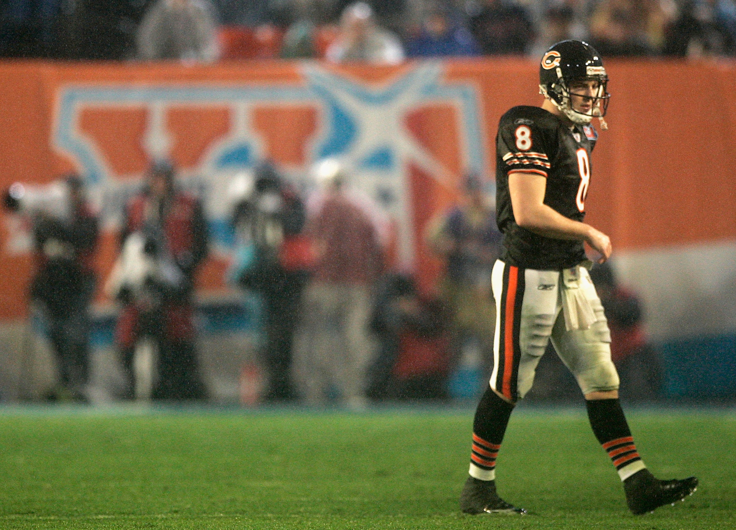 MIAMI GARDENS, FL - FEBRUARY 04:  Quarterback Rex Grossman #8 of the Chicago Bears walks off the field after throwing an interception against the Indianapolis Colts during Super Bowl XLI on February 4, 2007 at Dolphin Stadium in Miami Gardens, Florida.  T
