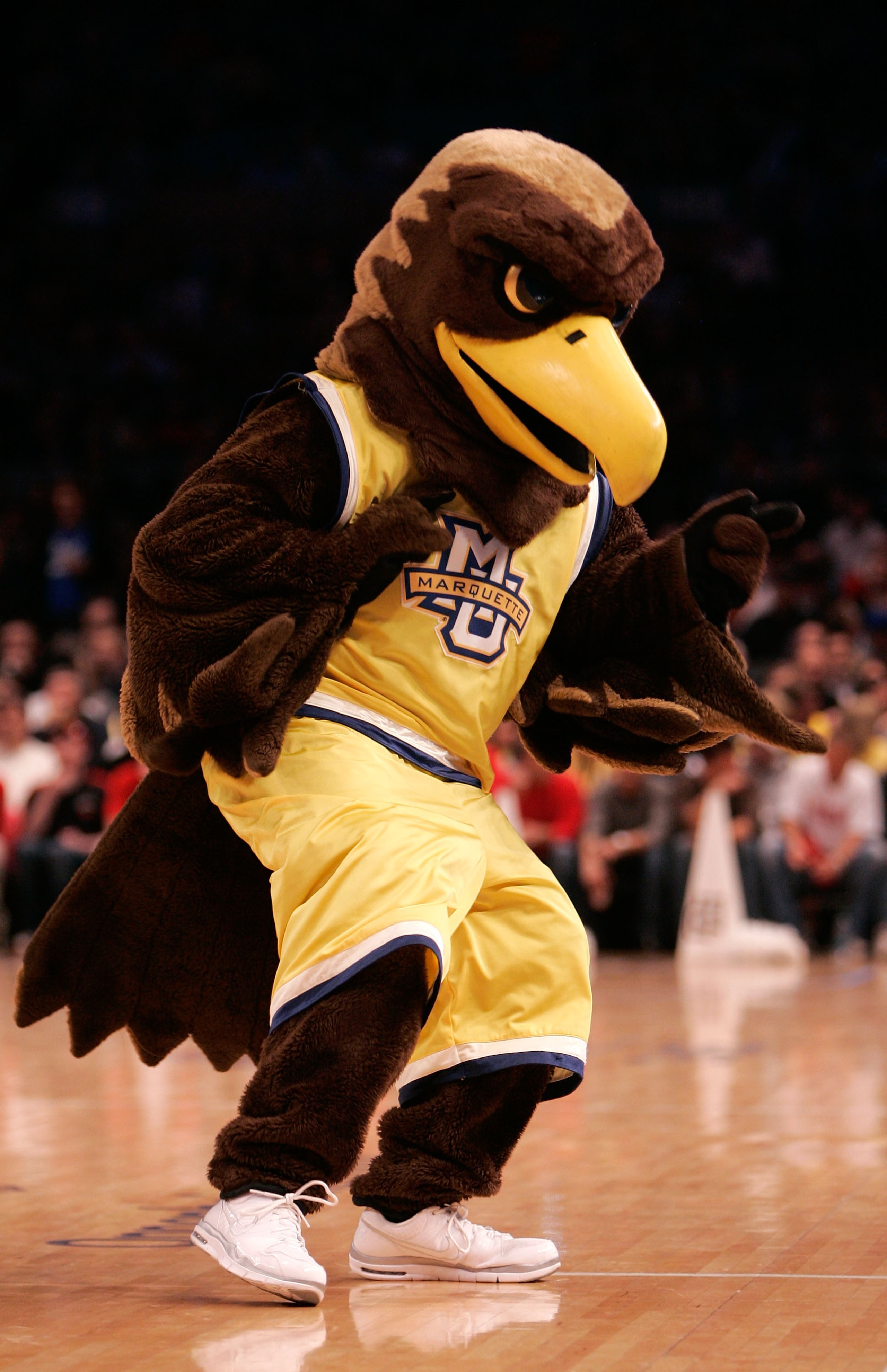 NEW YORK, NY - MARCH 10: The Marquette Golden Eagles mascot walks on the court during the game against the Louisville Cardinals during the quarterfinals of the 2011 Big East Men's Basketball Tournament presented by American Eagle Outfitters at Madison S NEW YORK, NY - MARCH 10: The Marquette Golden Eagles mascot walks on the court during the game against the Louisville Cardinals during the quarterfinals of the 2011 Big East Men's Basketball Tournament presented by American Eagle Outfitters at Madison S