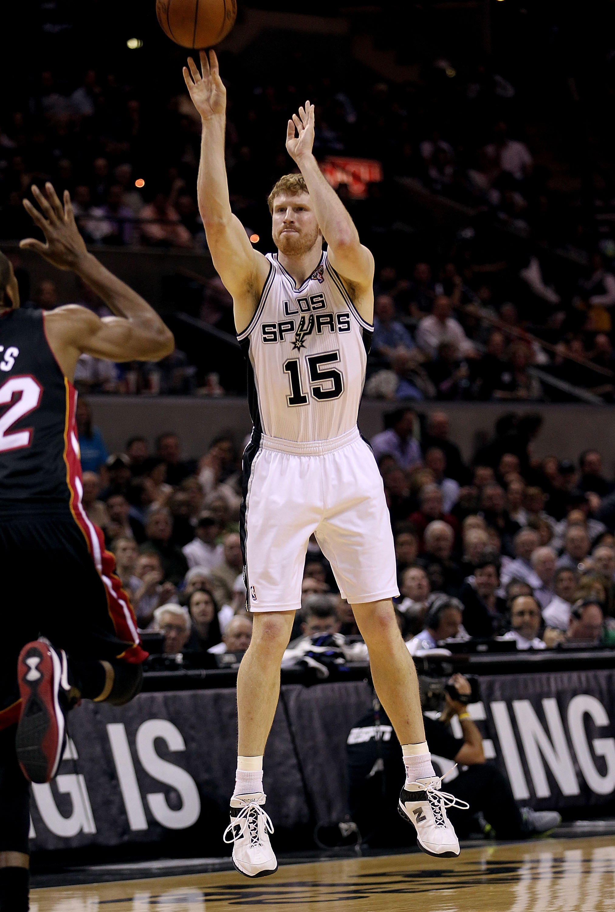 SAN ANTONIO, TX - MARCH 04:  Forward Matt Bonner #15 of the San Antonio Spurs takes a three point shot against the Miami Heat at AT&T Center on March 4, 2011 in San Antonio, Texas.   NOTE TO USER: User expressly acknowledges and agrees that, by downloadin