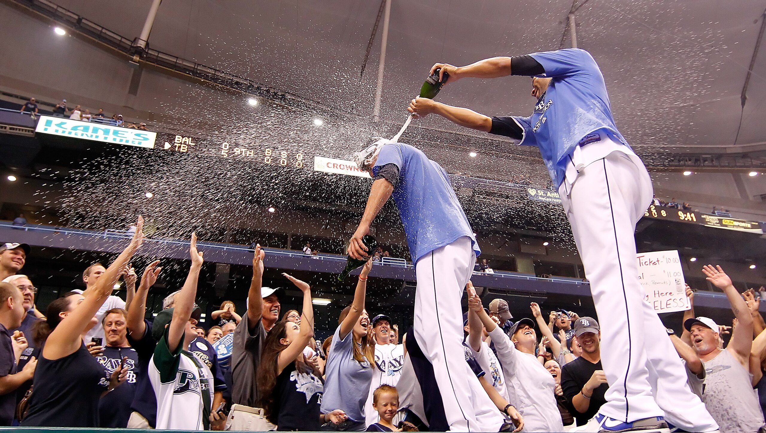 ST. PETERSBURG, FL - SEPTEMBER 28:  Pitchers Matt Garza #22 (L) and David Price #14 of the Tampa Bay Rays celebrate after the Rays clinched a playoff birth against the Baltimore Orioles at Tropicana Field on September 28, 2010 in St. Petersburg, Florida.