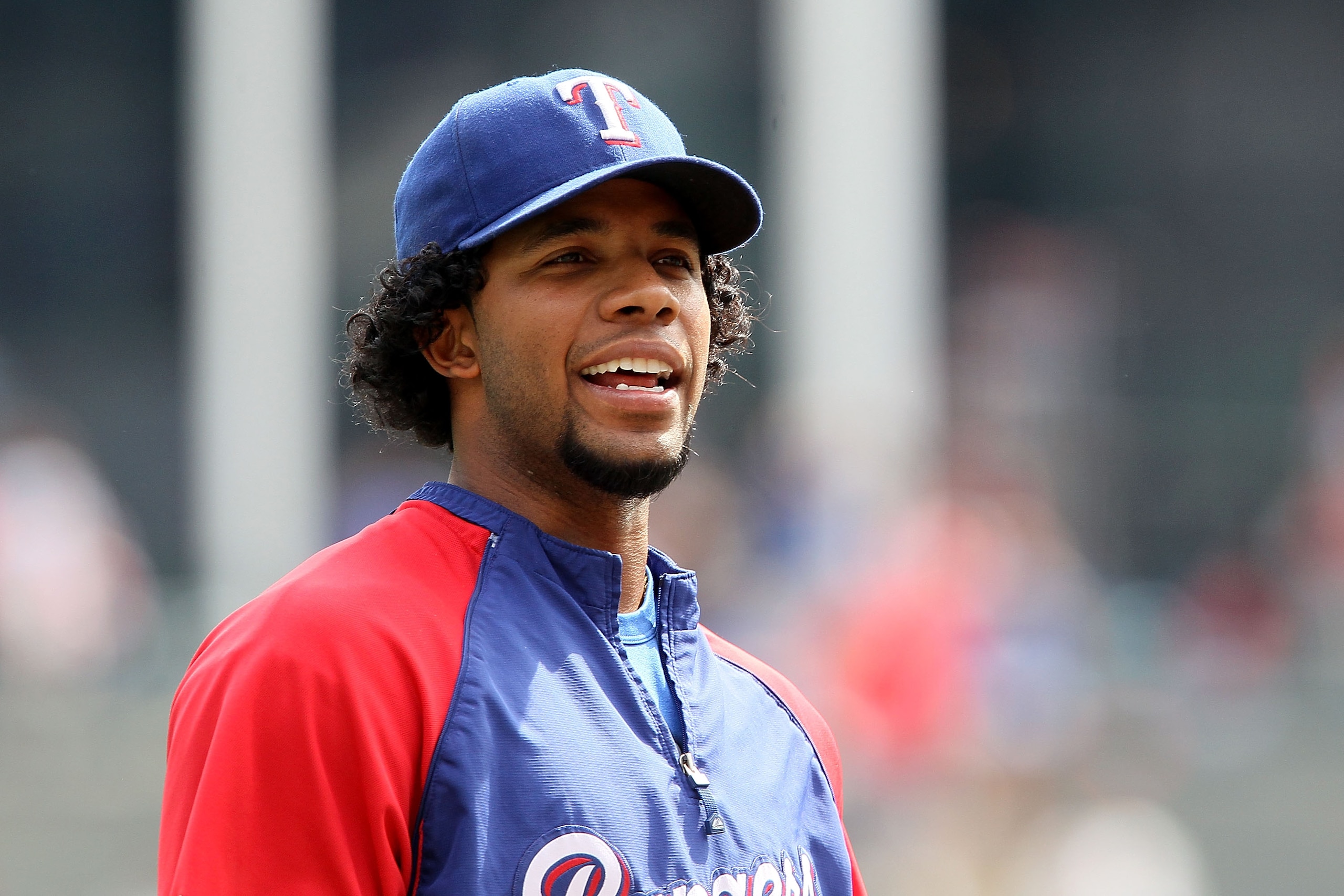 ARLINGTON, TX - OCTOBER 16:  Elvis Andrus #1 of the Texas Rangers looks on during batting practice against the New York Yankees prior to Game Two of the ALCS during the 2010 MLB Playoffs at Rangers Ballpark in Arlington on October 16, 2010 in Arlington, T
