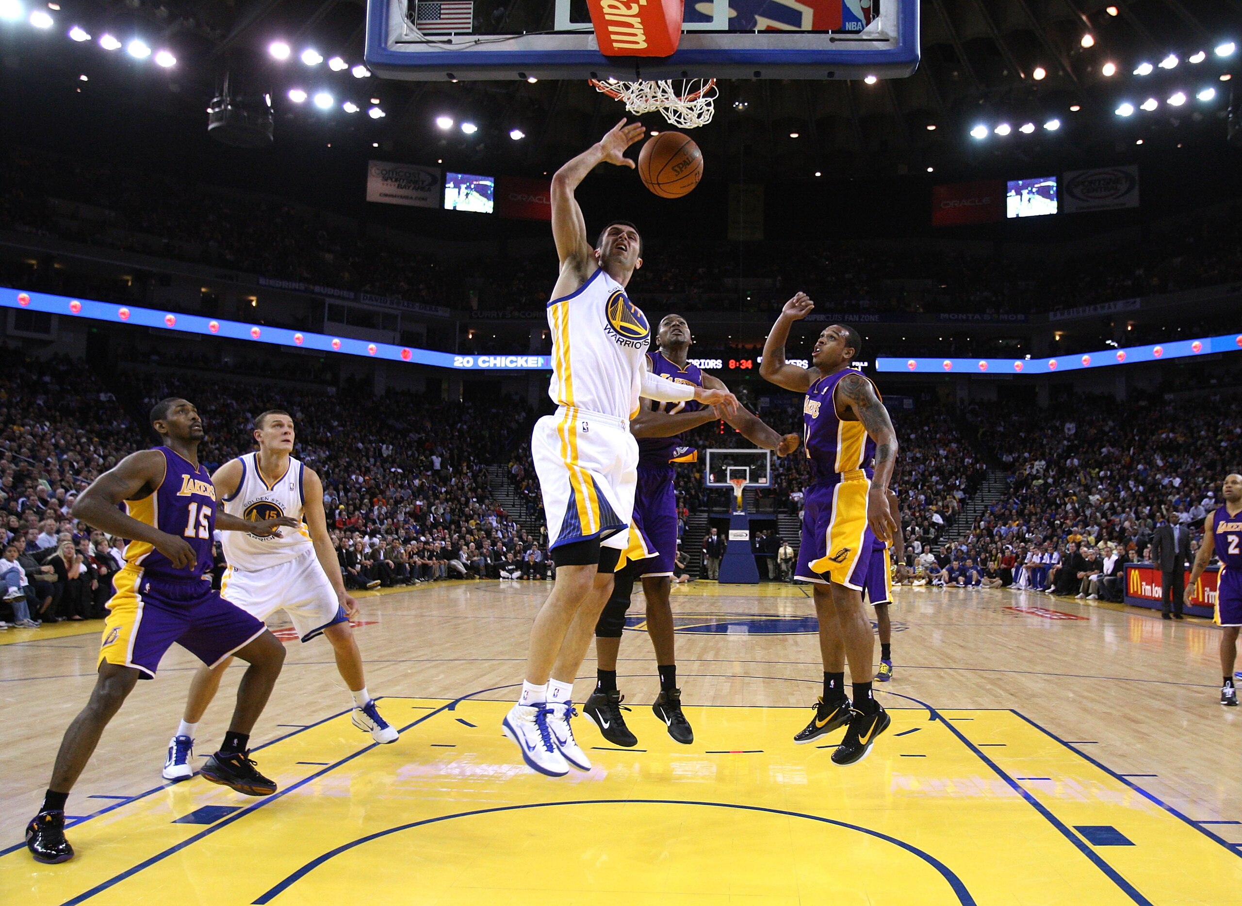 OAKLAND, CA - JANUARY 12:  Vladimir Radmanovic #77 of the Golden State Warriors in action against the Los Angeles Lakers at Oracle Arena on January 12, 2011 in Oakland, California. NOTE TO USER: User expressly acknowledges and agrees that, by downloading