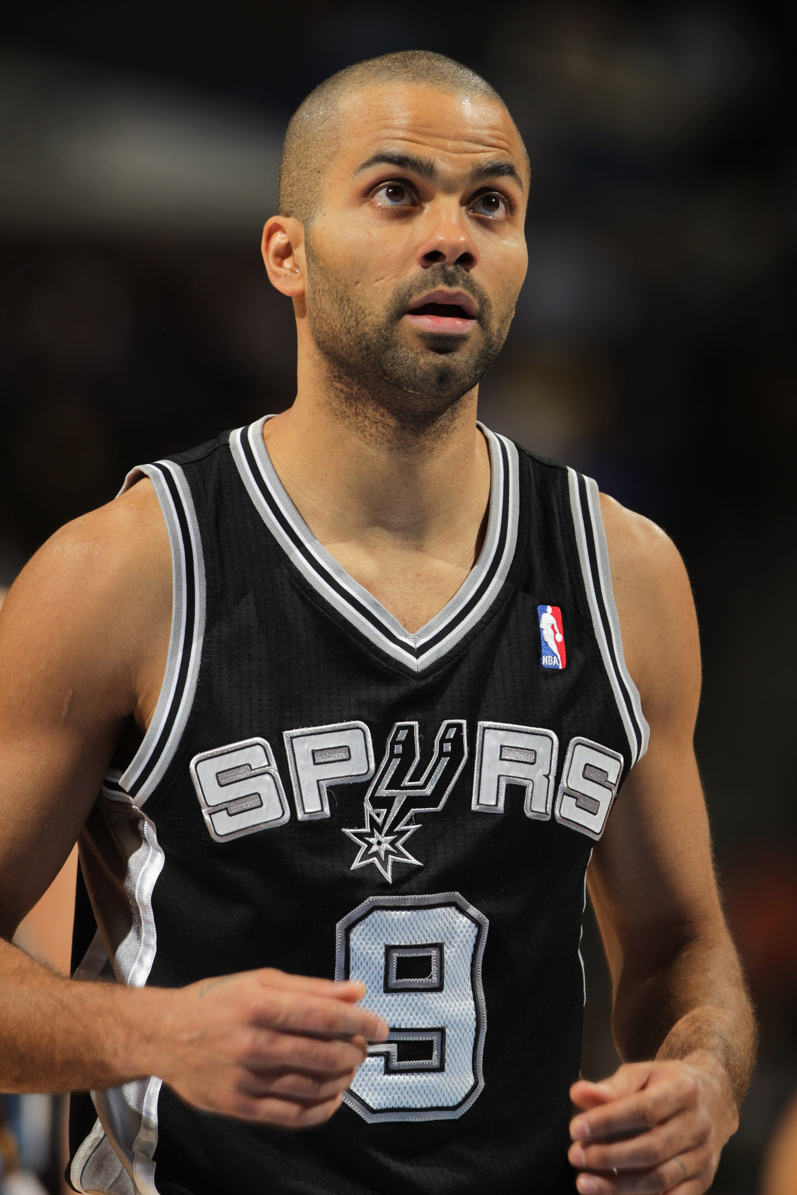 DENVER, CO - MARCH 23:  Tony Parker #9 of the San Antonio Spurs prepares to take a free throw against the Denver Nuggets at the Pepsi Center on March 23, 2011 in Denver, Colorado. The Nuggets defeated the Spurs 115-112. NOTE TO USER: User expressly acknow
