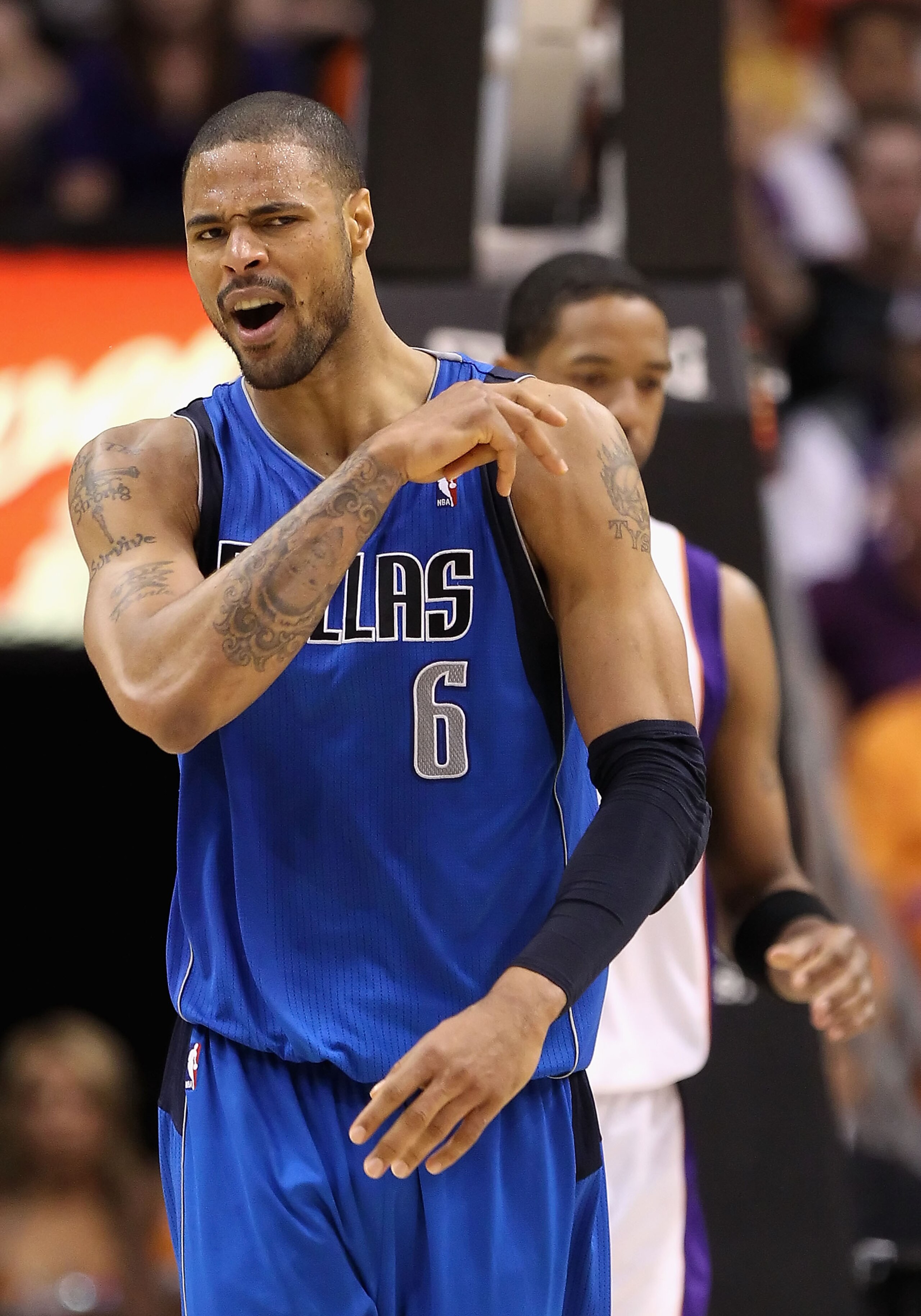 PHOENIX, AZ - MARCH 27:  Tyson Chandler #6 of the Dallas Mavericks reacts during the NBA game against the Phoenix Suns at US Airways Center on March 27, 2011 in Phoenix, Arizona.  The Mavericks defeated the Suns 91-83.  NOTE TO USER: User expressly acknow