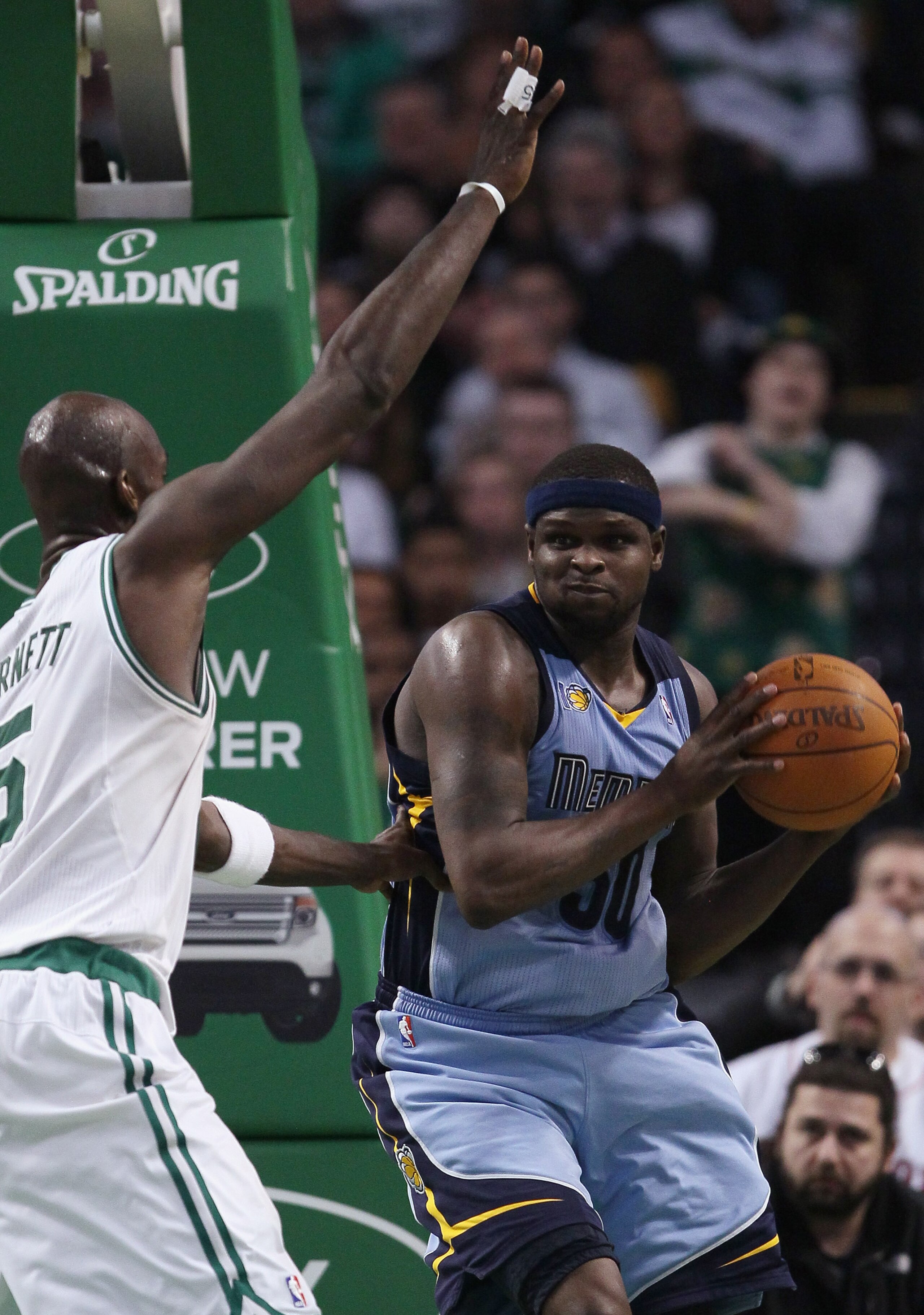 BOSTON, MA - MARCH 23:  Zach Randolph #50 of the Memphis Grizzlies looks to pass around Kevin Garnett #5 of the Boston Celtics on March 23, 2011 at the TD Garden in Boston, Massachusetts.  The Memphis Grizzlies defeated the Boston Celtics 90-87. NOTE TO U
