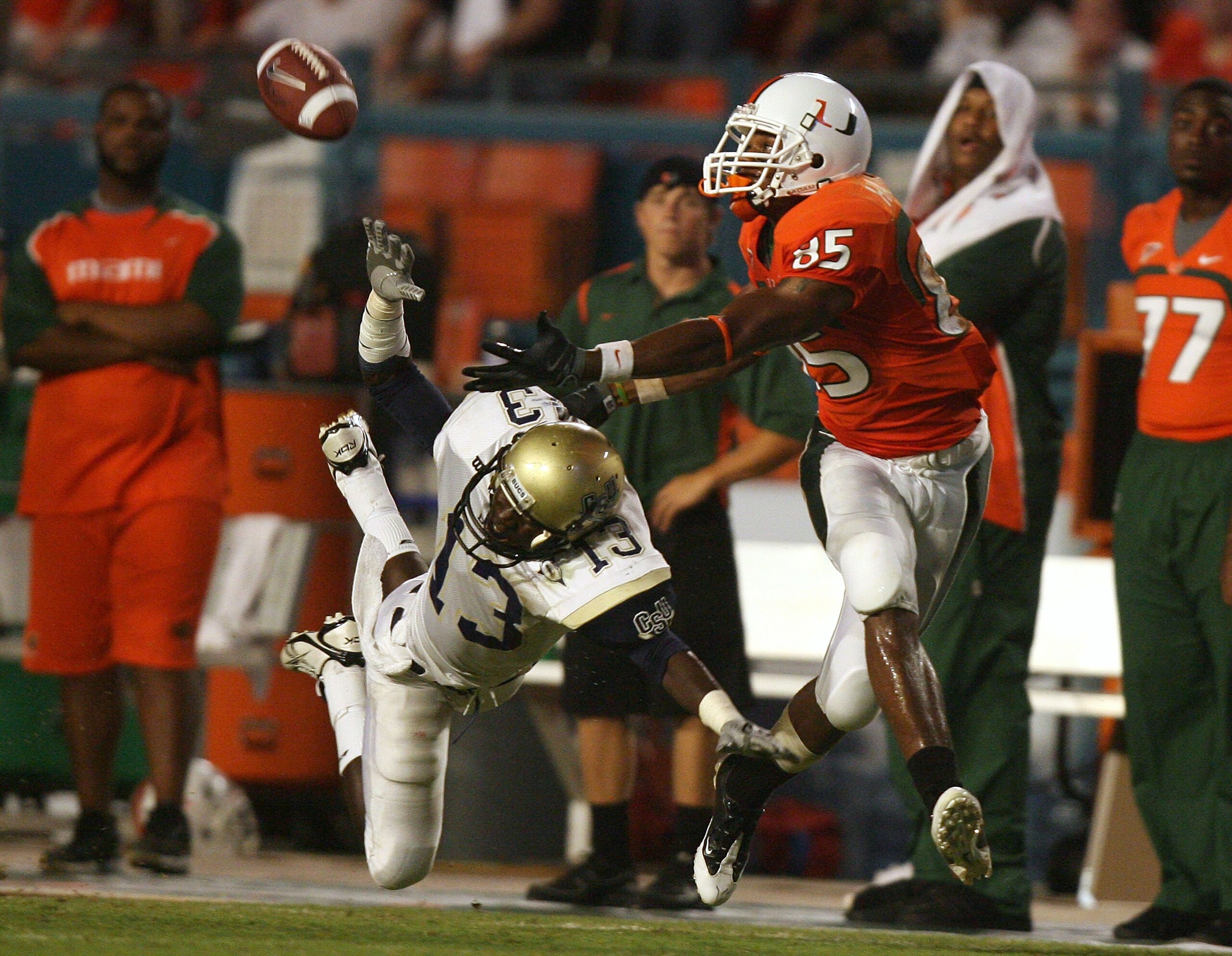 MIAMI - AUGUST 28: Defensive back Jacques Bazile #13 of the Charleston Southern Buccaneers dives to try and knock down a pass intended for wide receiver Leonard Hankerson #85 of the Miami Hurricanes at Dolphin Stadium on August 28, 2008 in Miami, Florida MIAMI - AUGUST 28: Defensive back Jacques Bazile #13 of the Charleston Southern Buccaneers dives to try and knock down a pass intended for wide receiver Leonard Hankerson #85 of the Miami Hurricanes at Dolphin Stadium on August 28, 2008 in Miami, Florida
