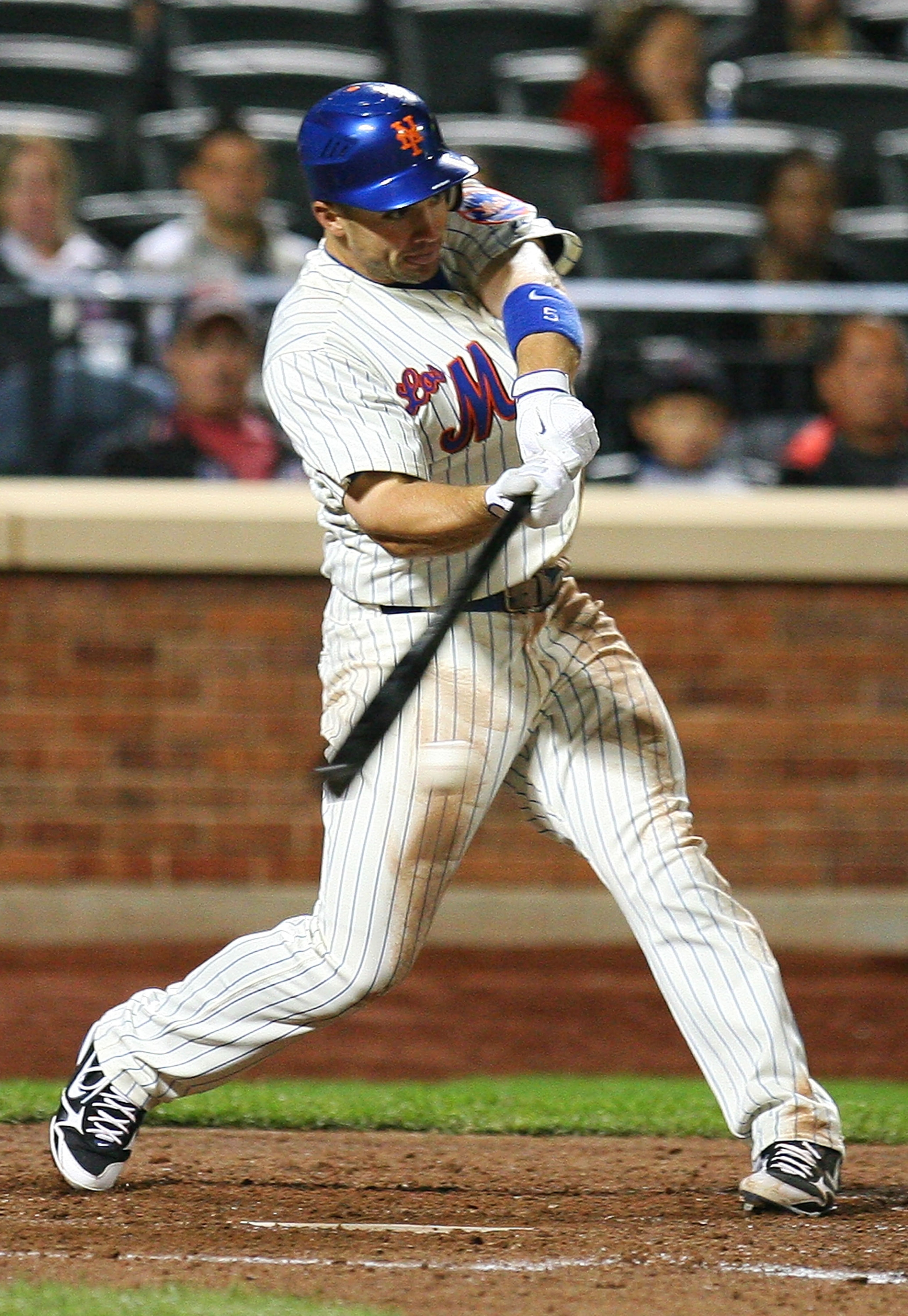 NEW YORK - SEPTEMBER 17: David Wright #5 of the New York Mets bats against the Atlanta Braves on September 17, 2010 at Citi Field in the Flushing neighborhood of the Queens borough of New York City. The Braves defeated the Mets 6 - 4.  (Photo by Andrew Bu