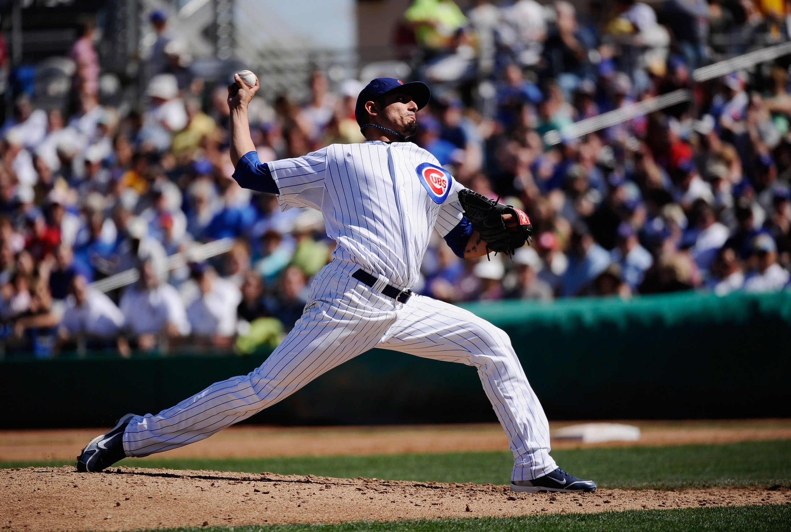 MESA, AZ - MARCH 09:  Matt Garza #17 pitcher of the Chicago Cubs throws a ptich against the Kansas City Royals during the spring training baseball game at HoHoKam Stadium on March 9, 2011 in Mesa, Arizona.  (Photo by Kevork Djansezian/Getty Images)