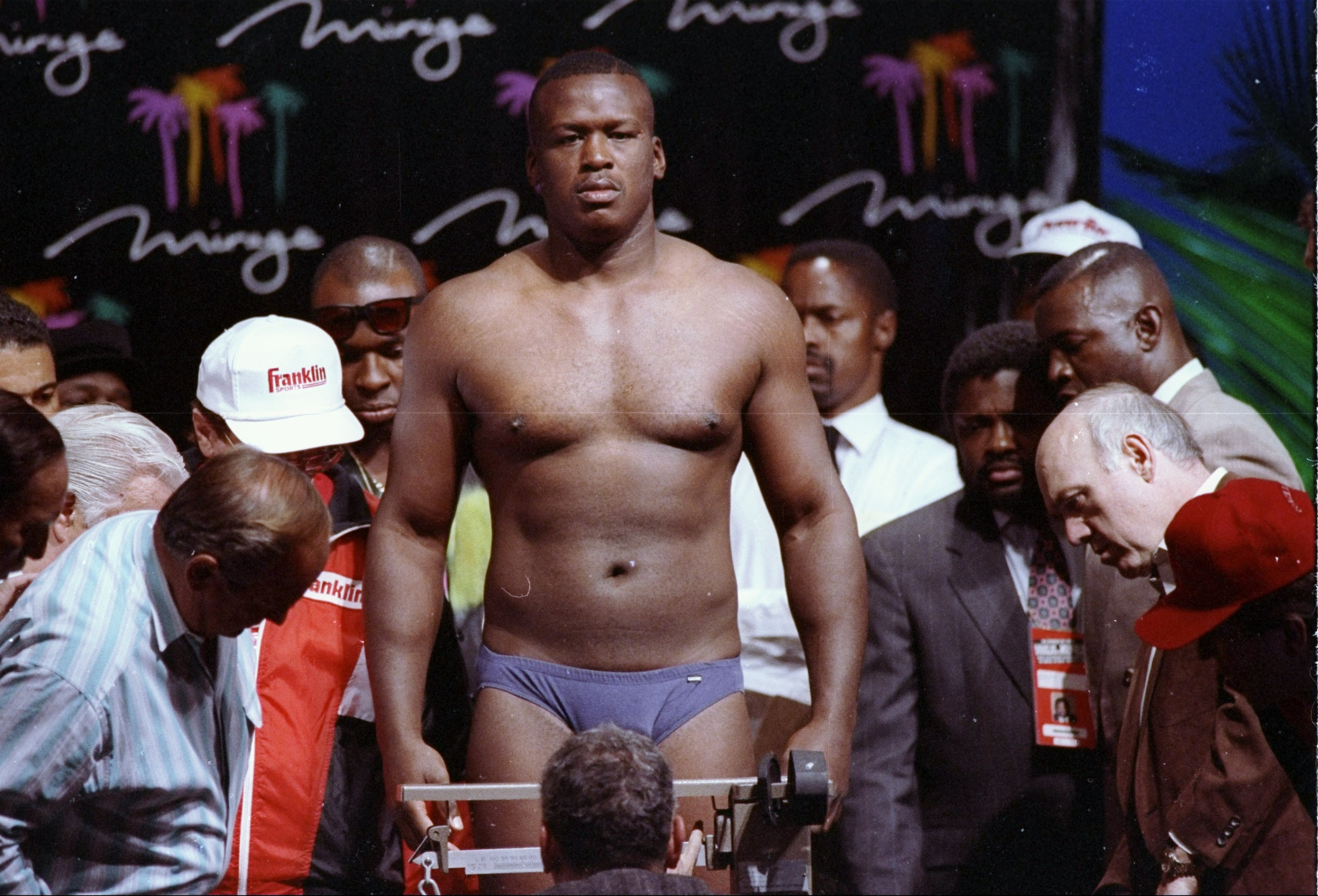 24 Oct 1990:  James (Buster) Douglas is weighed prior to his fight against Evander Holyfield. Mandatory Credit: Holly Stein  /Allsport