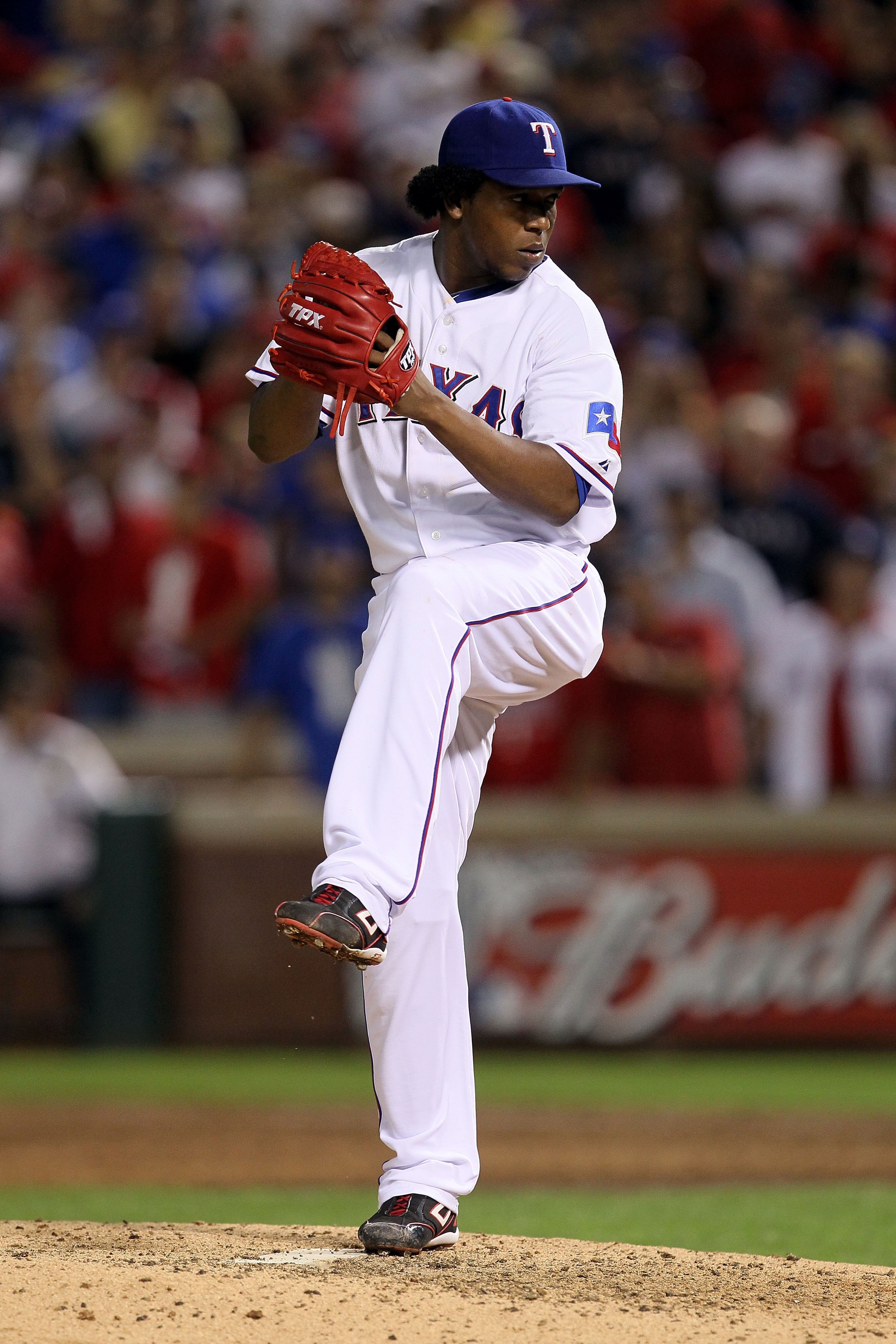 ARLINGTON, TX - OCTOBER 22:  Neftali Feliz #30 of the Texas Rangers throws a pitch against the New York Yankees in the ninth inning of Game Six of the ALCS during the 2010 MLB Playoffs at Rangers Ballpark in Arlington on October 22, 2010 in Arlington, Tex