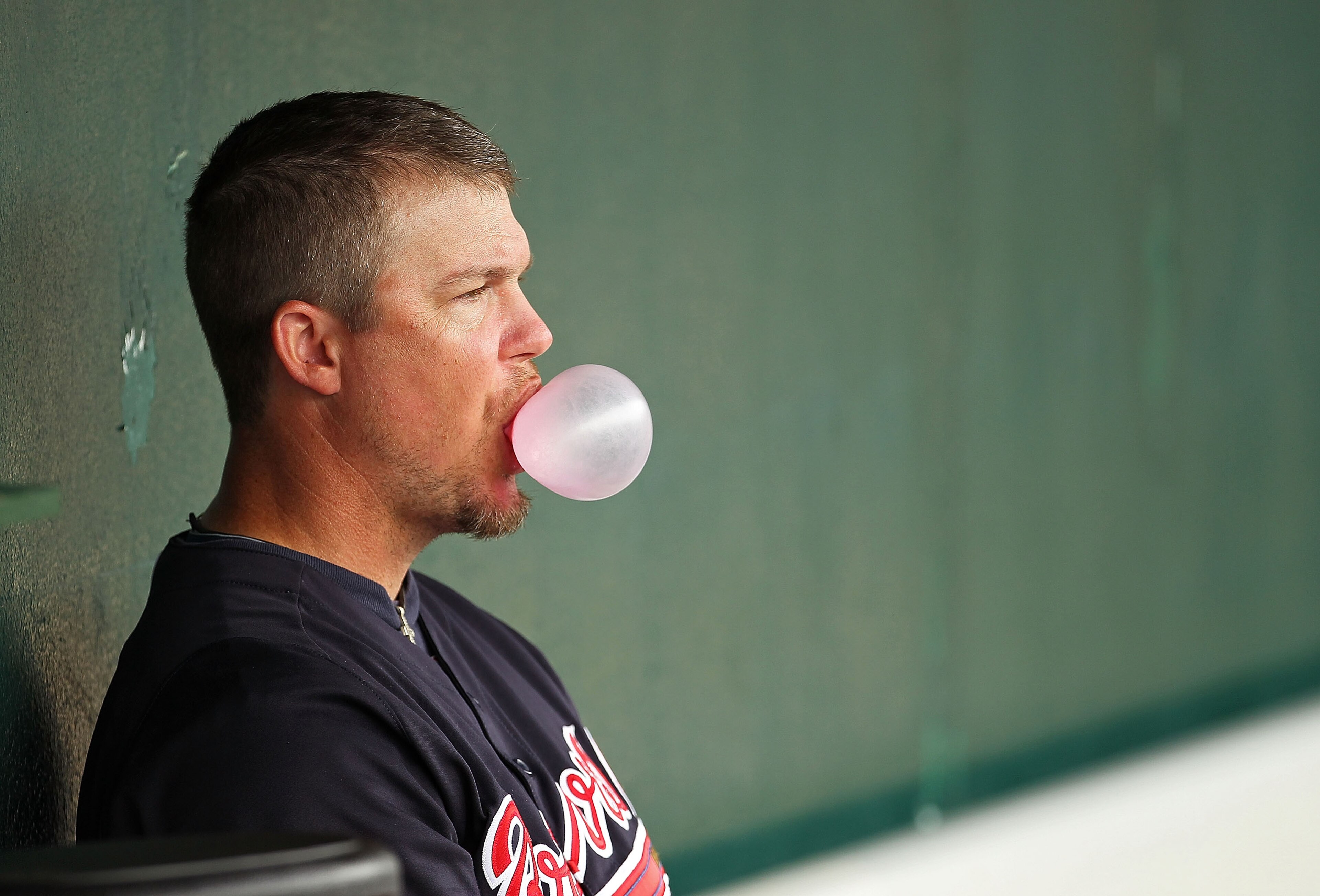 KISSIMMEE, FL - MARCH 01: Chipper Jones #10 of the Atlanta Braves looks on from the dugout during a Spring Training game against the Houston Astros at Osceola County Stadium on March 1, 2011 in Kissimmee, Florida. (Photo by Mike Ehrmann/Getty Images) KISSIMMEE, FL - MARCH 01: Chipper Jones #10 of the Atlanta Braves looks on from the dugout during a Spring Training game against the Houston Astros at Osceola County Stadium on March 1, 2011 in Kissimmee, Florida. (Photo by Mike Ehrmann/Getty Images)