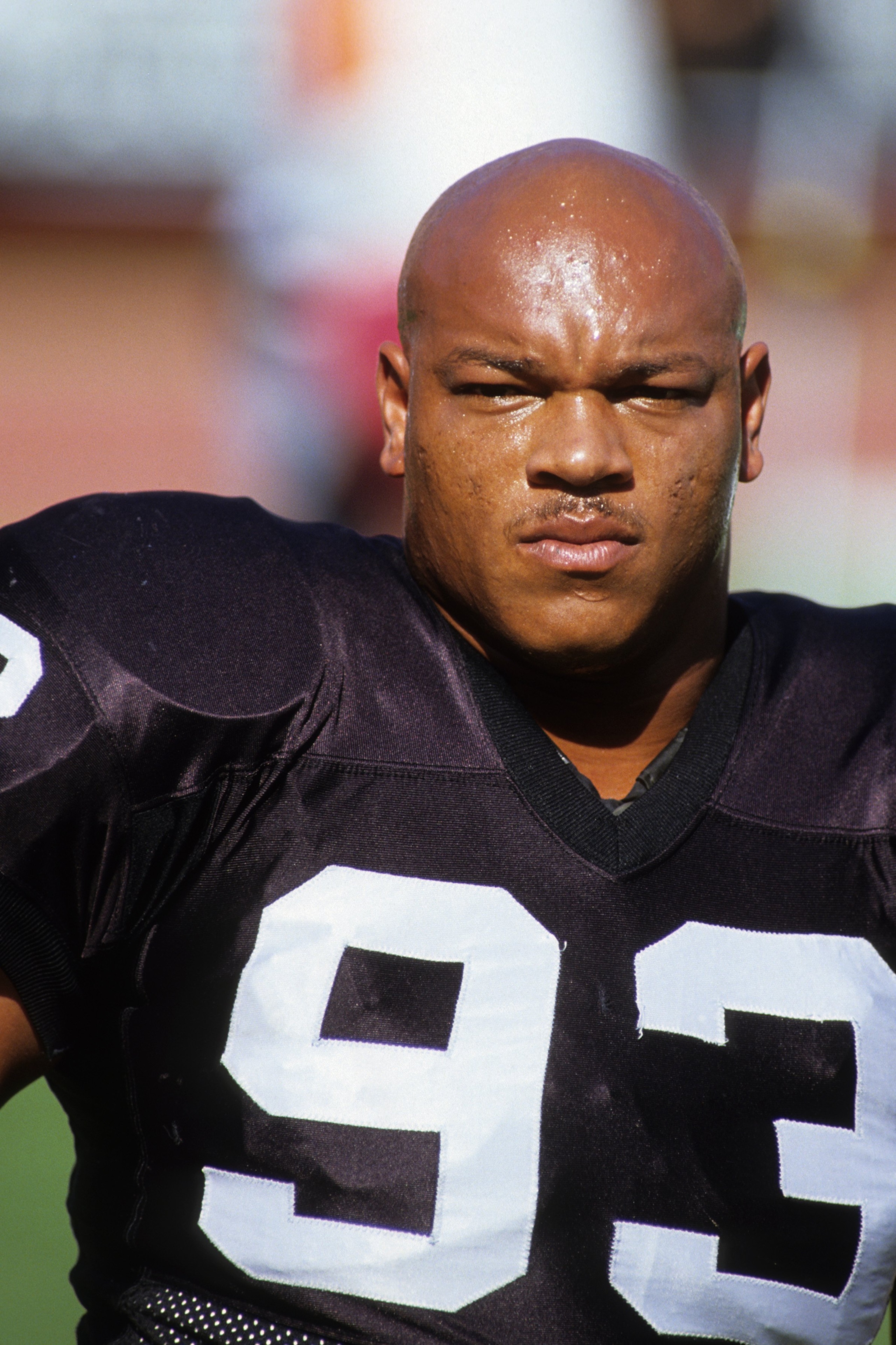 LOS ANGELES - NOVEMBER 11:  Defensive end Greg Townsend #93 of the Los Angeles Raiders looks on during the game against the Green Bay Packers at the Los Angeles Memorial Coliseum on November 11, 1990 in Los Angeles, California.  The Packers won 29-16.  (P