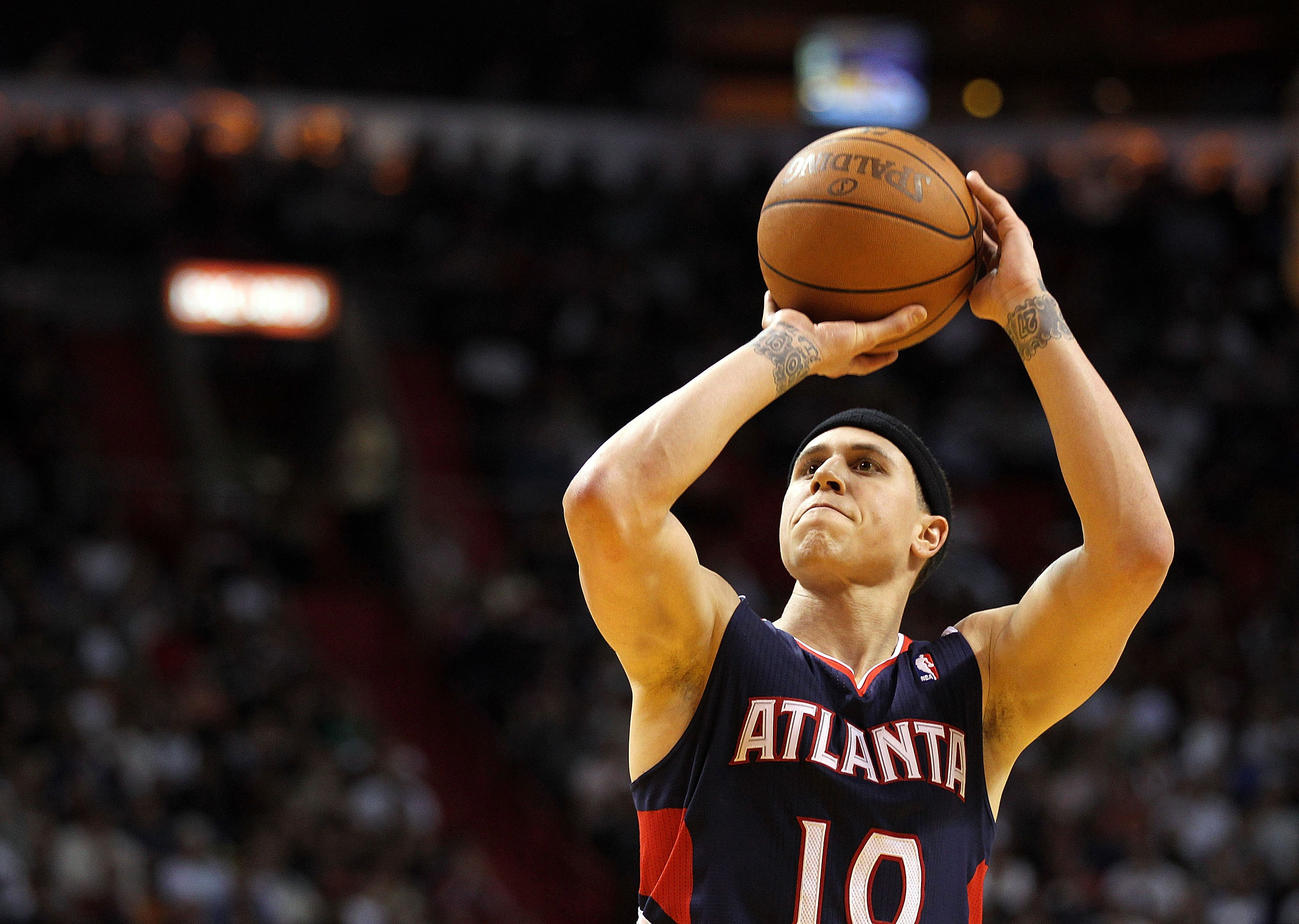 MIAMI, FL - JANUARY 18:  Mike Bibby #10 of the Atlanta Hawks shoots a free throw during a game against the Miami Heat at American Airlines Arena on January 18, 2011 in Miami, Florida. NOTE TO USER: User expressly acknowledges and agrees that, by downloadi