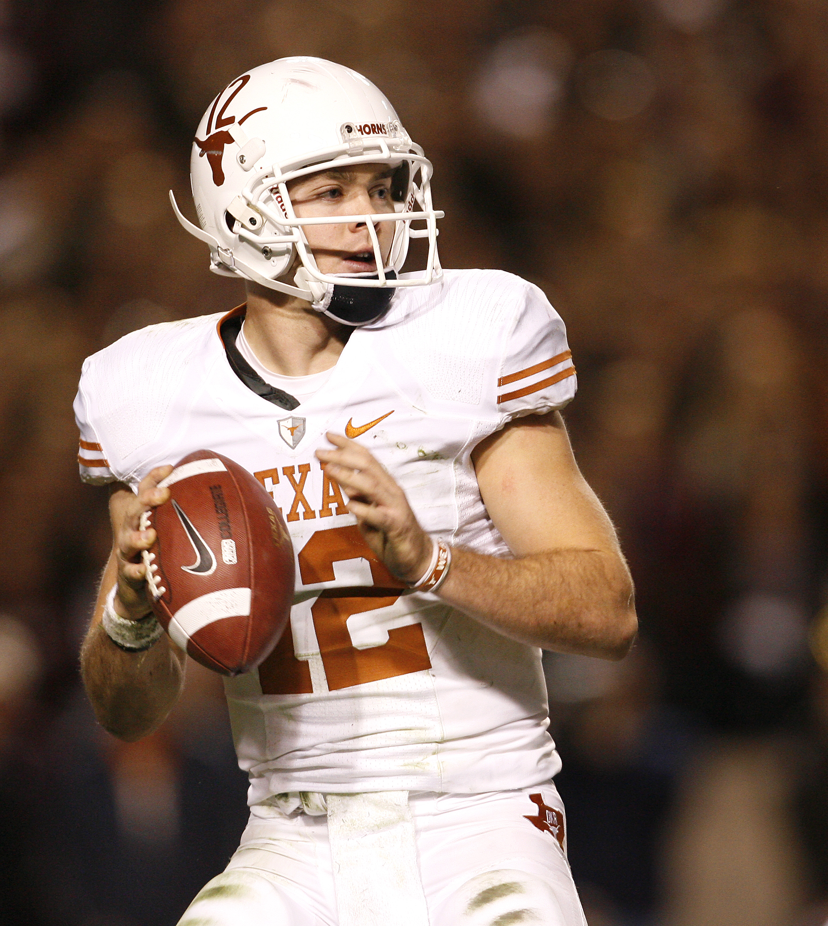 COLLEGE STATION, TX - NOVEMBER 26: Quarterback Colt McCoy #12 of the Texas Longhorns looks to pass the ball downfield against the Texas A&M Aggies in the second half at Kyle Field on November 26, 2009 in College Station, Texas. The Longhorns defeated the
