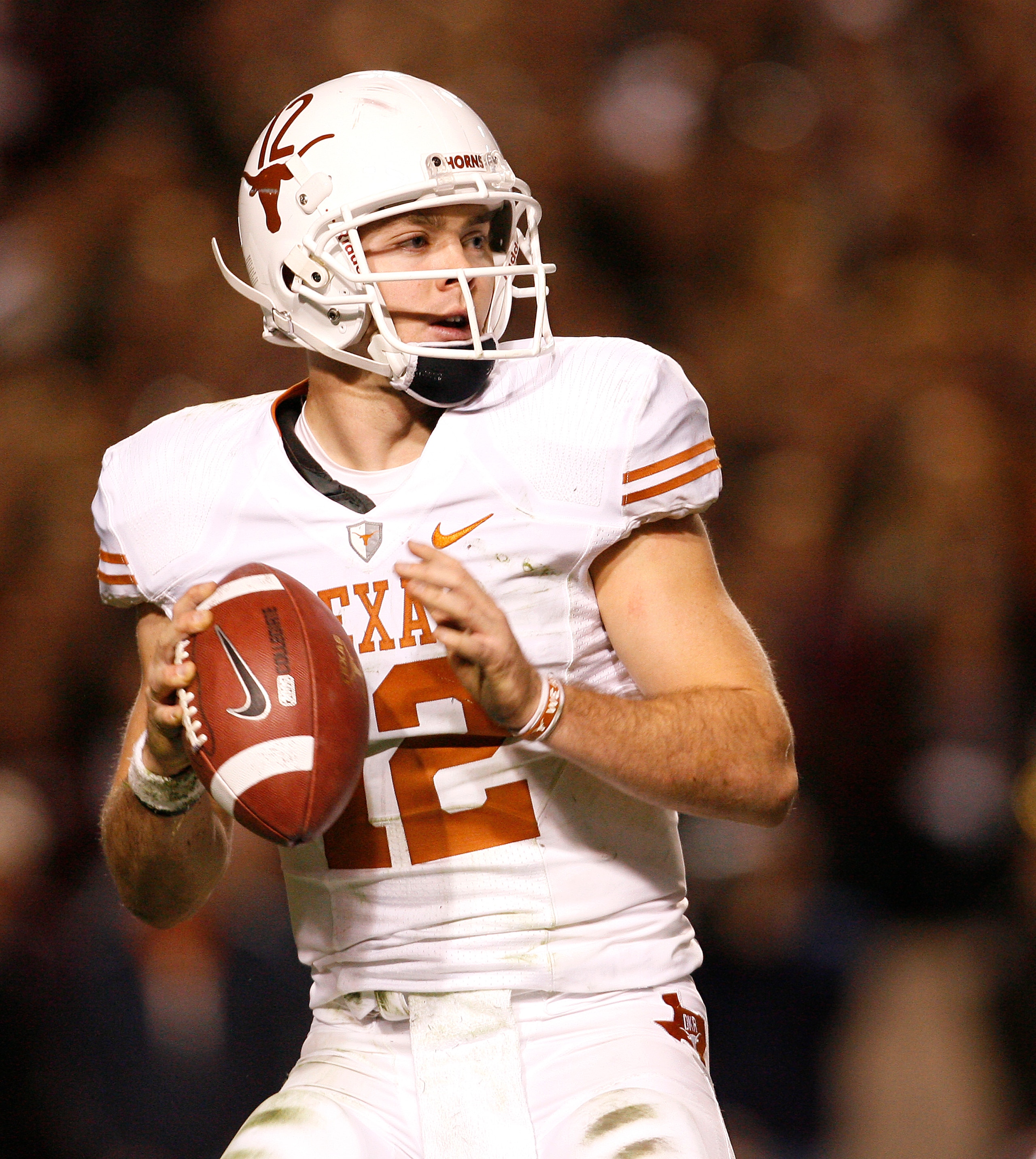 COLLEGE STATION, TX - NOVEMBER 26: Quarterback Colt McCoy #12 of the Texas Longhorns looks to pass the ball downfield against the Texas A&M Aggies in the second half at Kyle Field on November 26, 2009 in College Station, Texas. The Longhorns defeated the