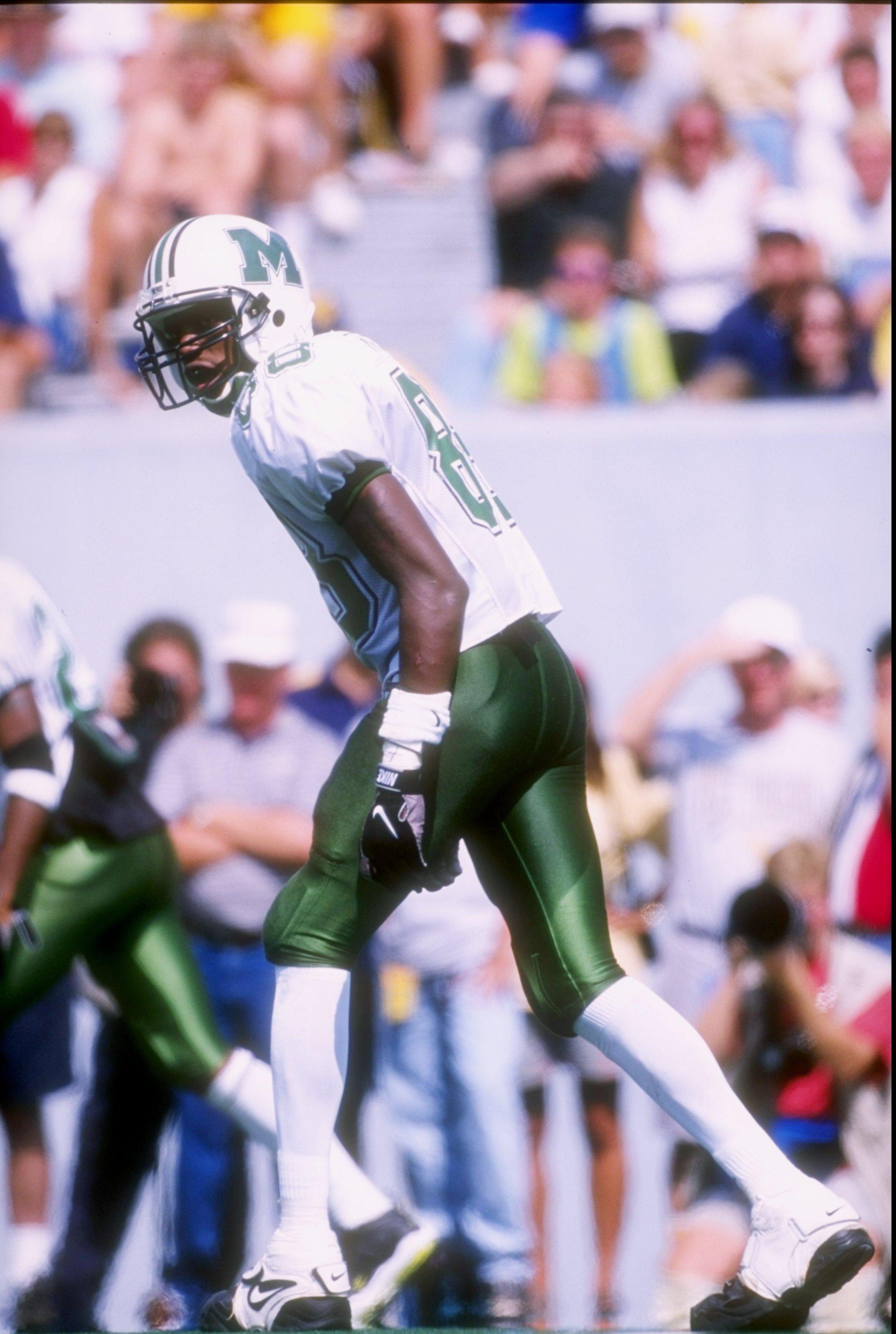 30 Aug 1997:  Wide receiver Randy Moss of the Marshall Thundering Herd runs down the field during a game against the West Virginia Mountaineers at Mountaineer Field in Morgantown, West Virginia.  West Virginia won the game 42-31. Mandatory Credit: Rick