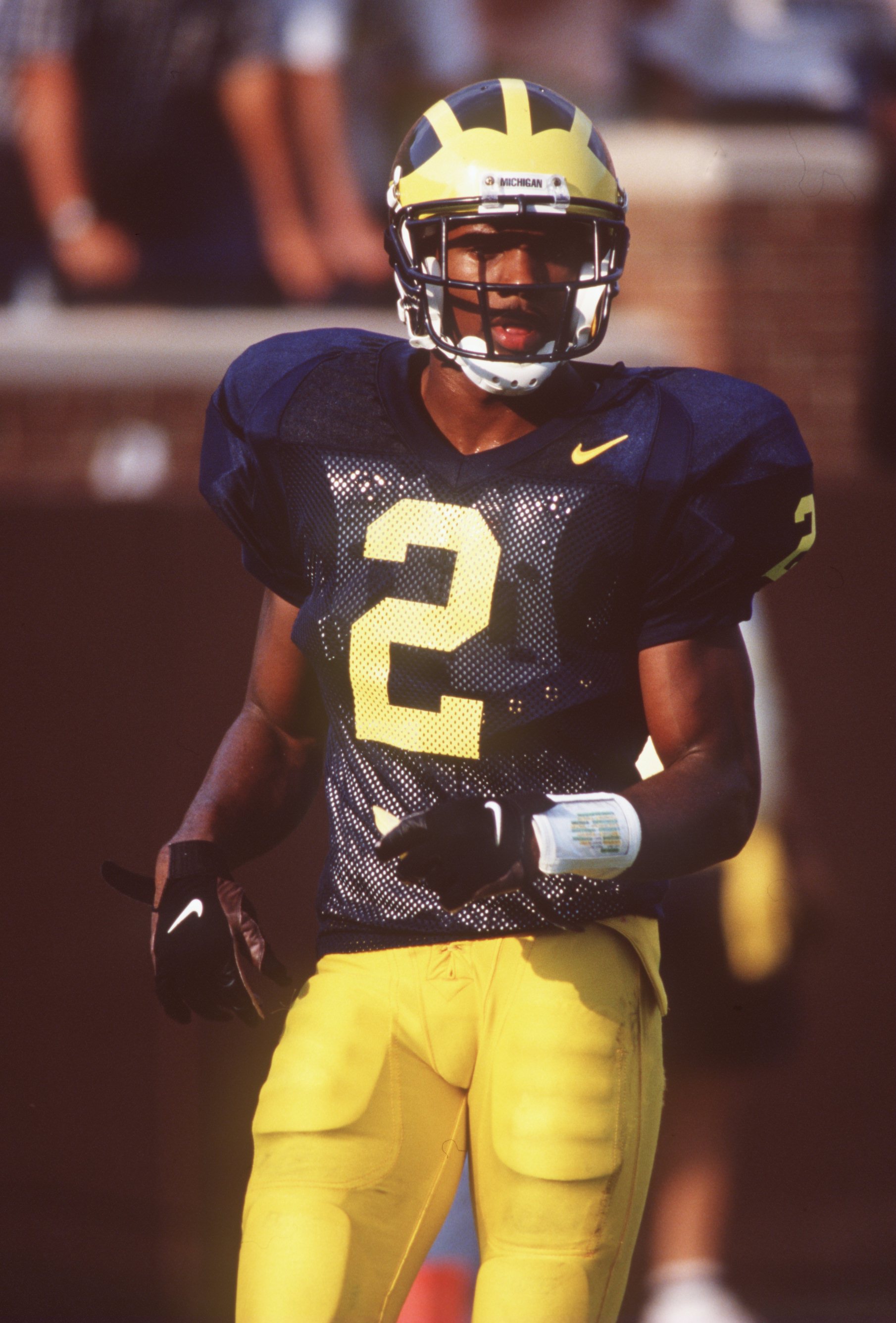 31 Aug 1996: Charles Woodson of Michigan waits for a play during their 20-8 victory over Illinois at Michigan stadium in Ann Arbor, Michigan.