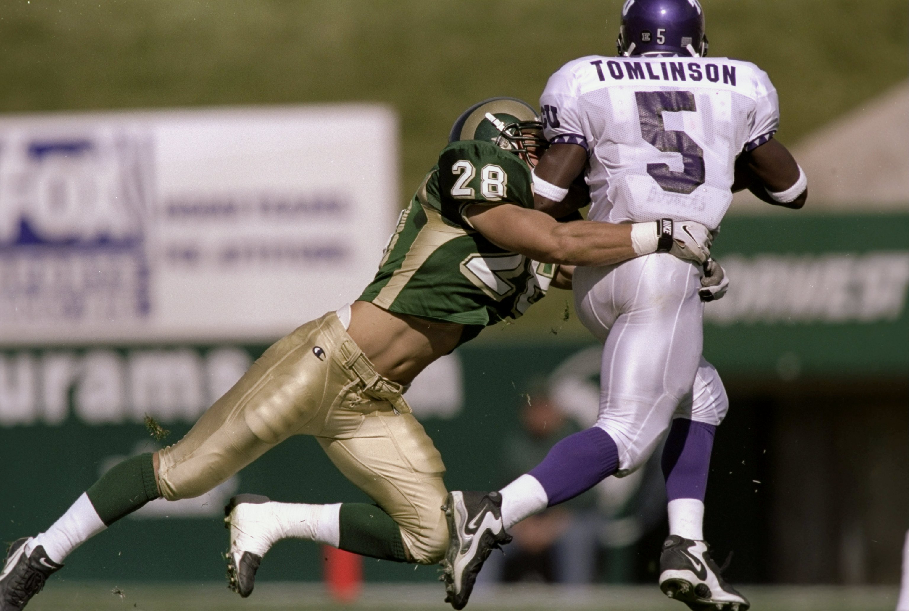 24 Oct 1998:  Defensive back Eric Olson #28 of the Colorado State Rams in action against tailback LaDainian Tomlinson #5 of the TCU Horned Frogs during the game at the Hughes Stadium in Fort Collins, Colorado. The Rams defeated the Horned Frogs 42-21. Man