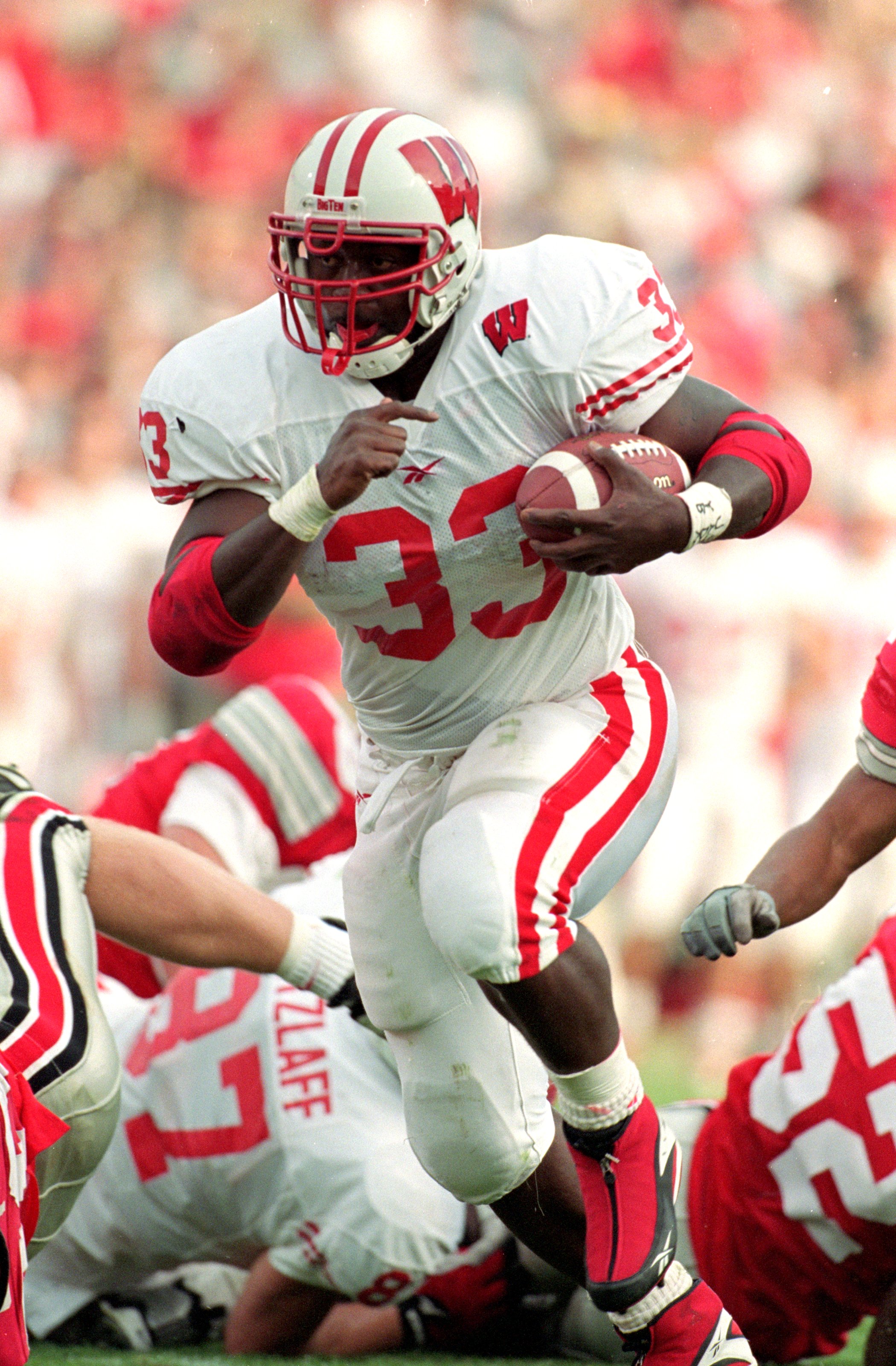 2 Oct 1999: Ron Dayne #33 of the Wisconsin Badgers carries the ball during the game against the Ohio State Buckeyes at the Ohio Stadium in Columbus, Ohio. The Badgers defeated the Buckeyes 42-17. Mandatory Credit: Tom Hauck  /Allsport