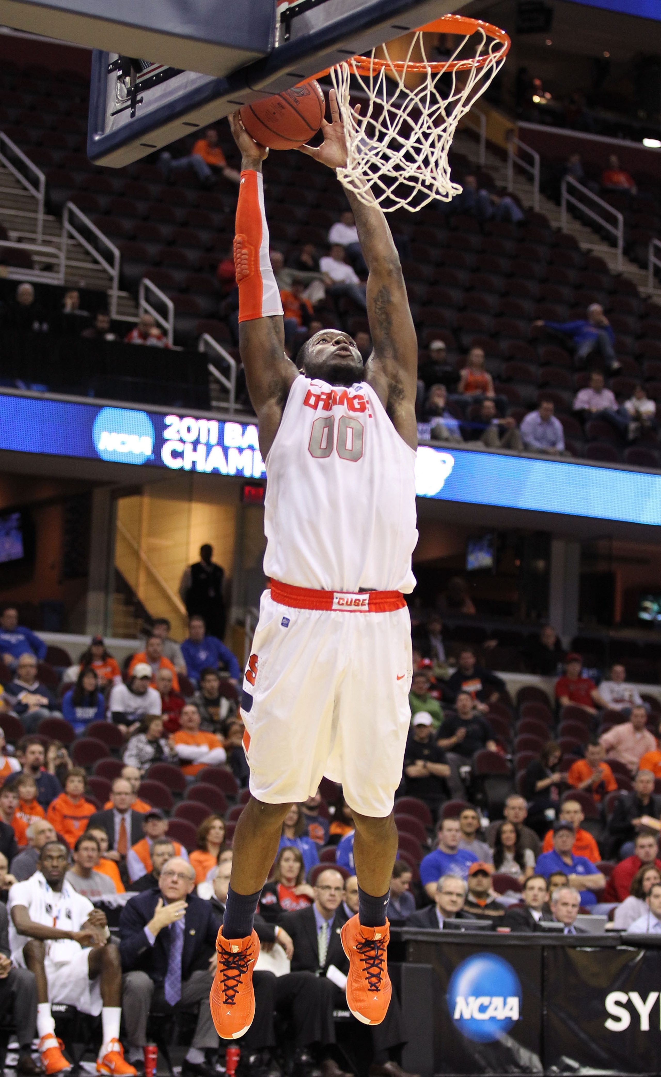 CLEVELAND, OH - MARCH 18: Rick Jackson #00 of the Syracuse Orange goes up for a dunk against the Indiana State Sycamores during the second round of the 2011 NCAA men's basketball tournament at Quicken Loans Arena on March 18, 2011 in Cleveland, Ohio. (Ph CLEVELAND, OH - MARCH 18: Rick Jackson #00 of the Syracuse Orange goes up for a dunk against the Indiana State Sycamores during the second round of the 2011 NCAA men's basketball tournament at Quicken Loans Arena on March 18, 2011 in Cleveland, Ohio. (Ph